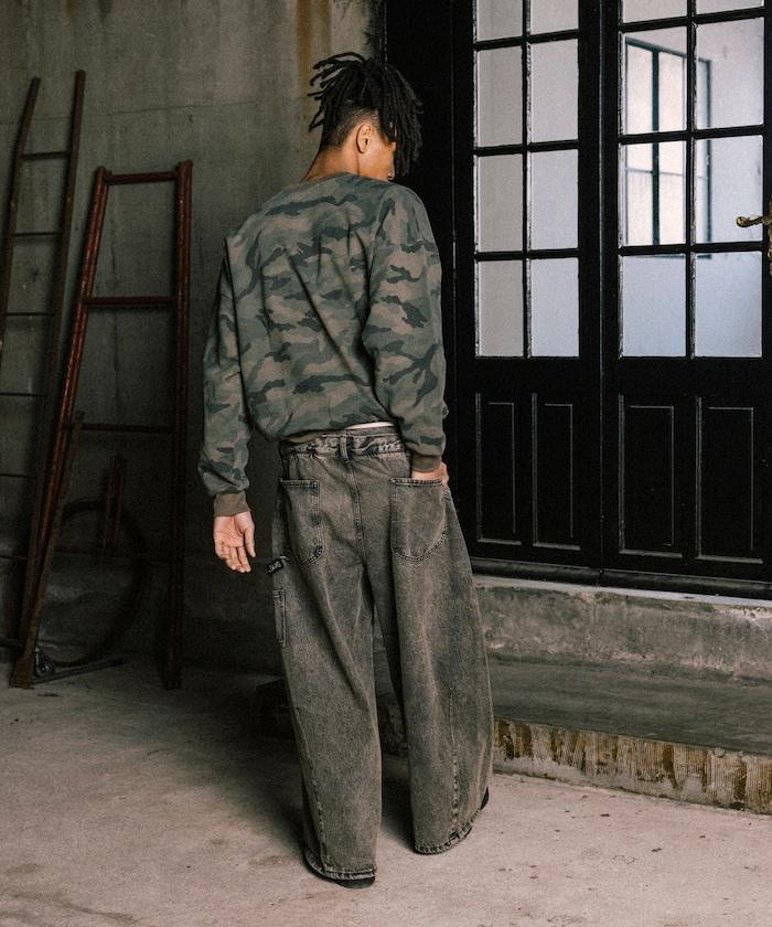 雙腰部破洞寬鬆弧形牛仔褲