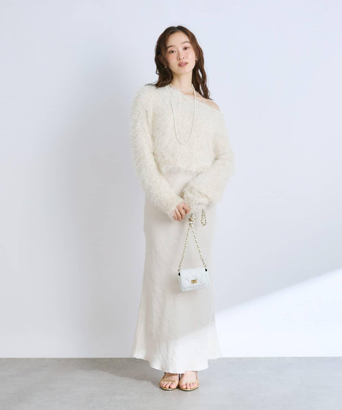 羽毛亮絲針織衫