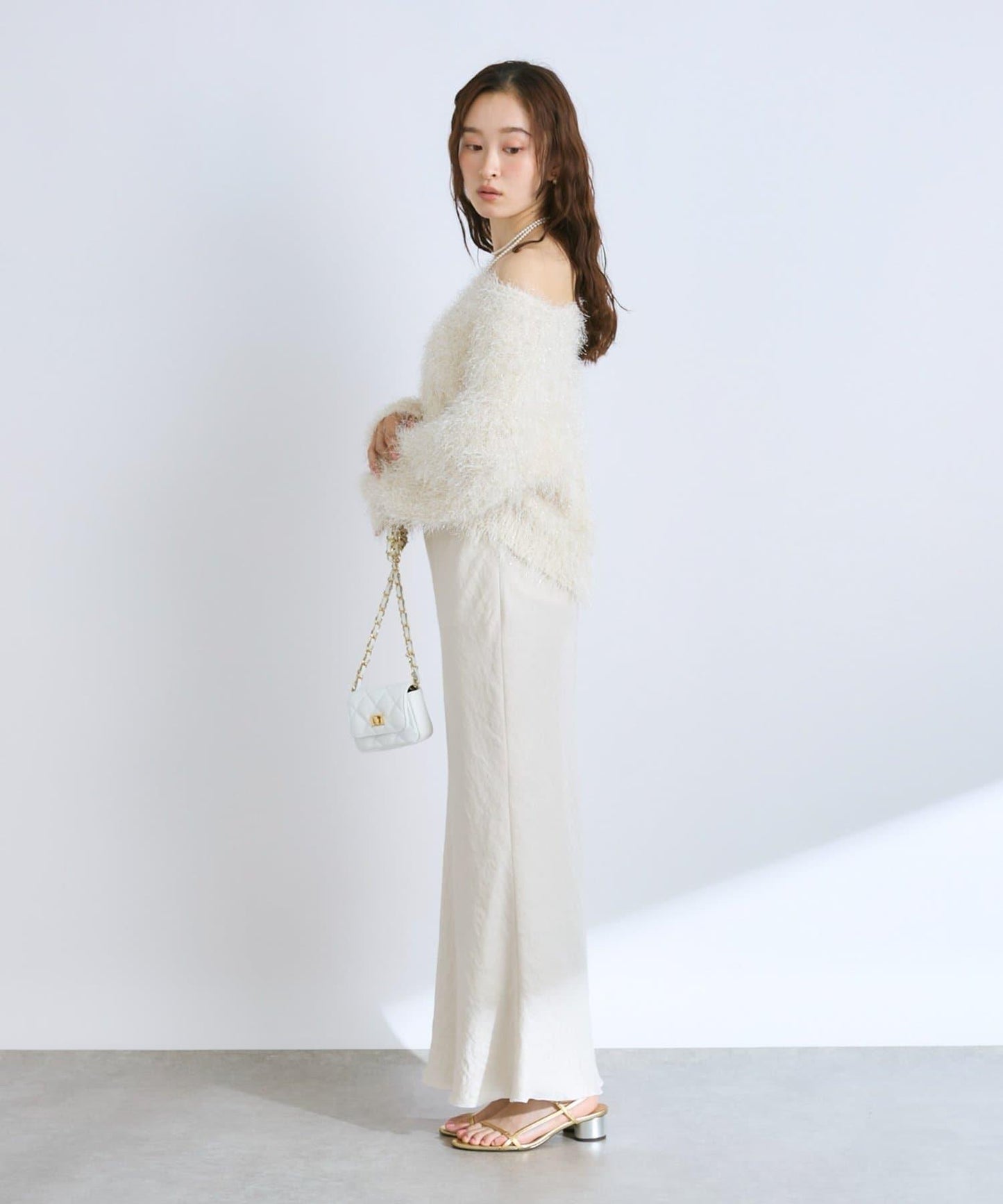 羽毛亮絲針織衫