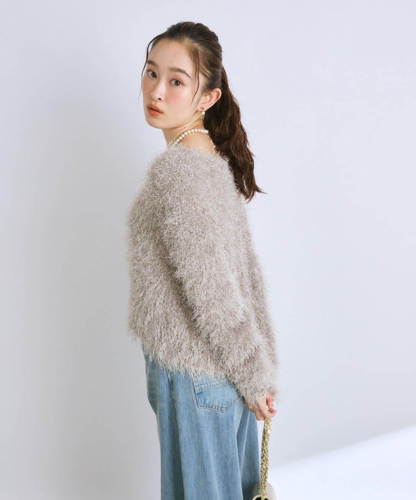 羽毛亮絲針織衫