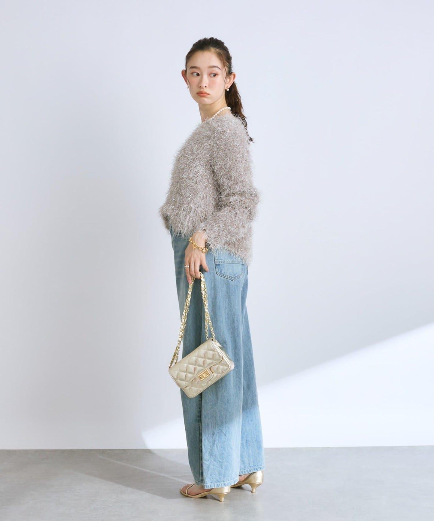 羽毛亮絲針織衫