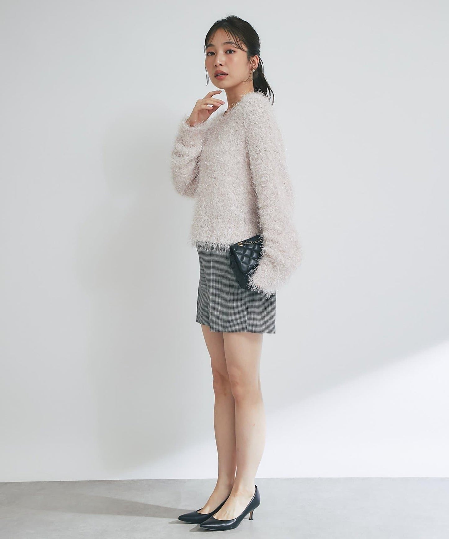 羽毛亮絲針織衫