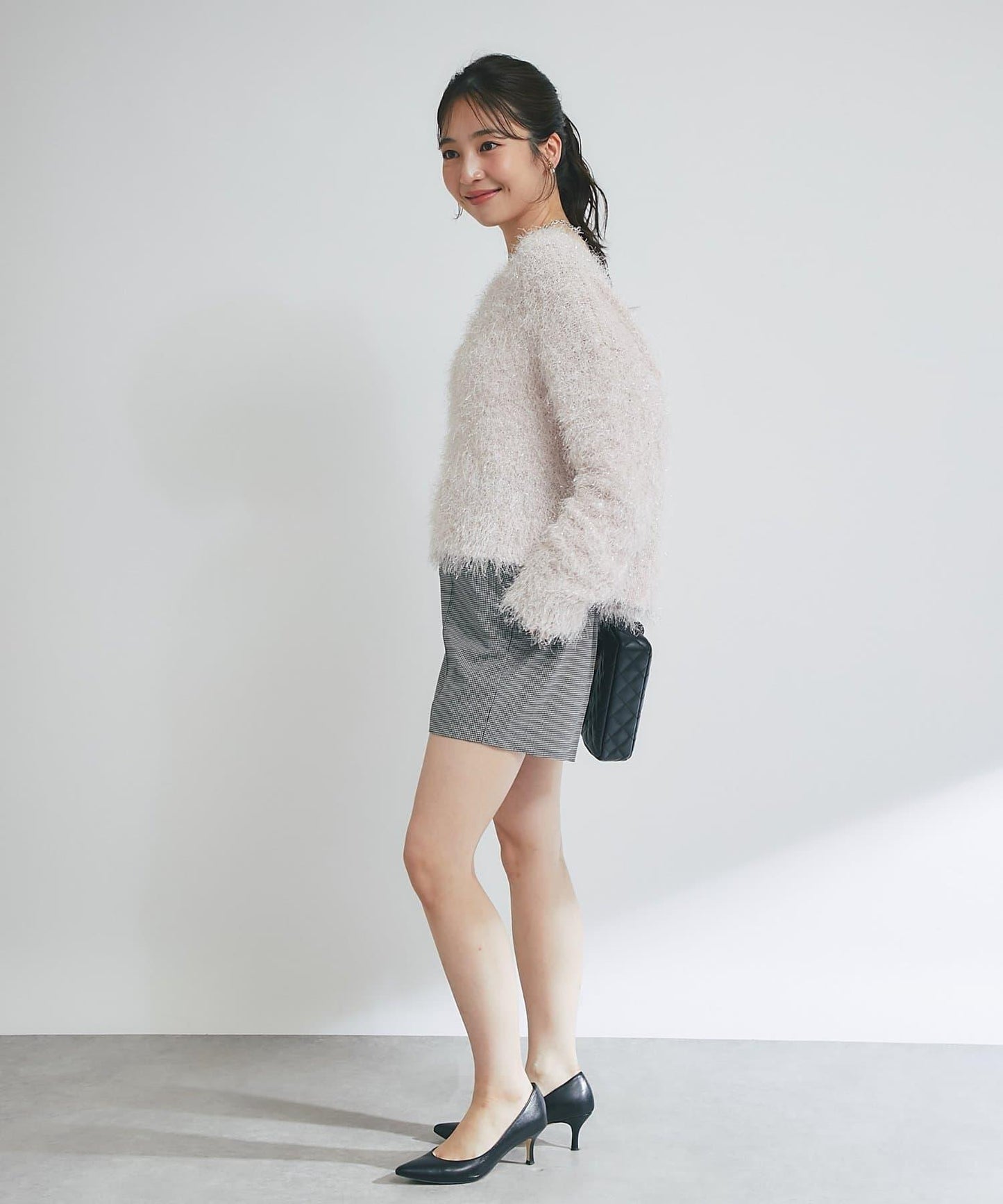 羽毛亮絲針織衫