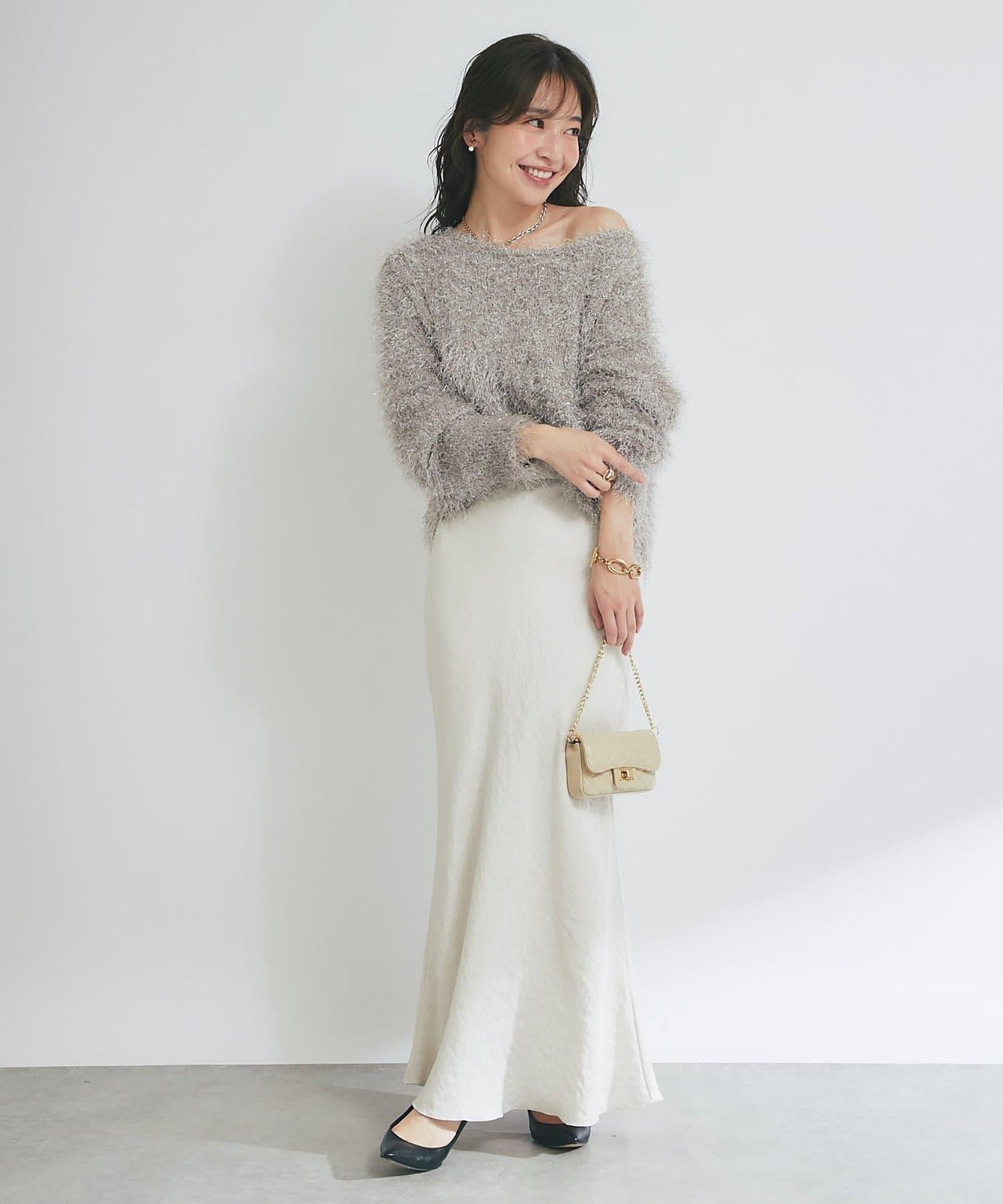 羽毛亮絲針織衫