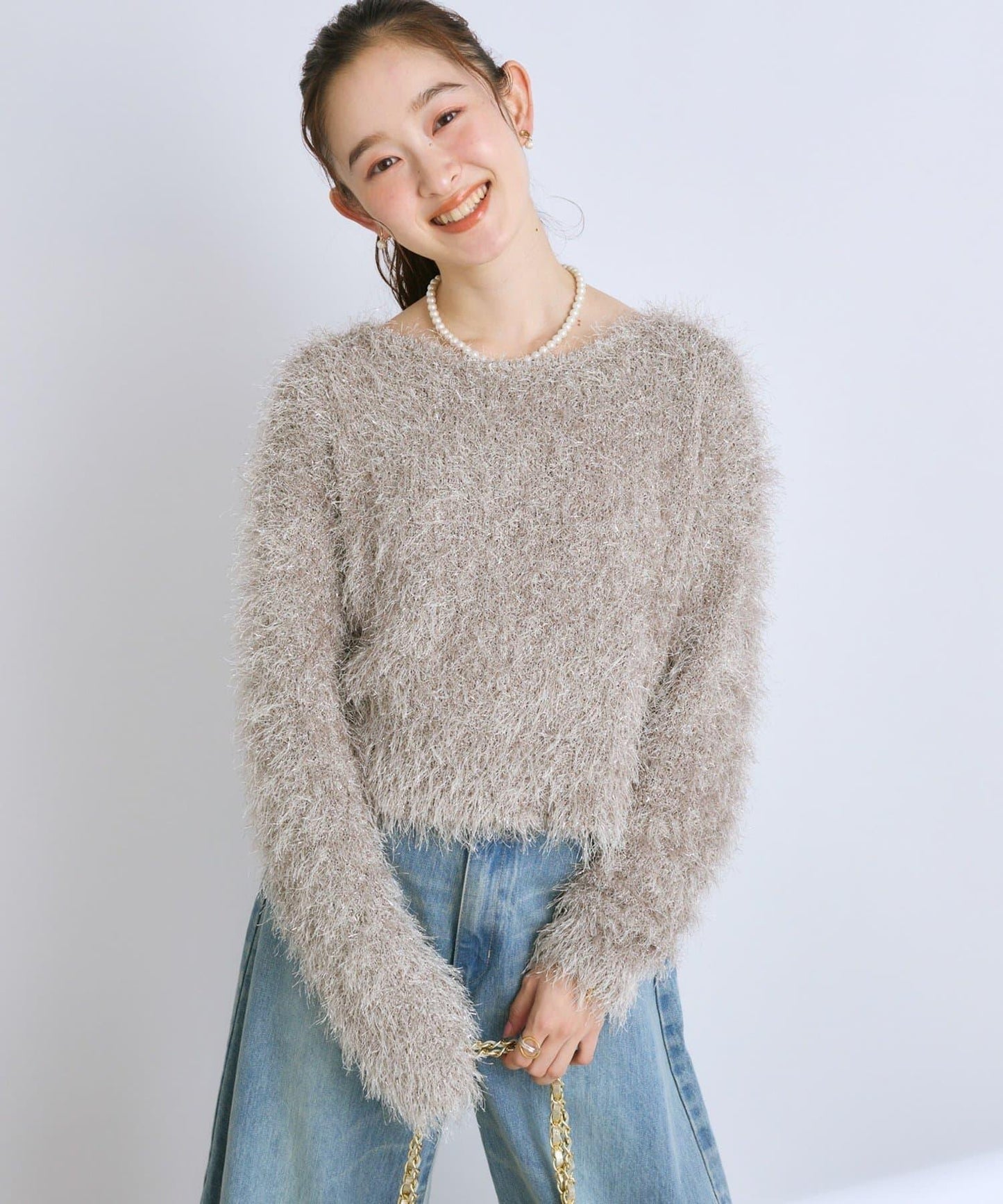 羽毛亮絲針織衫