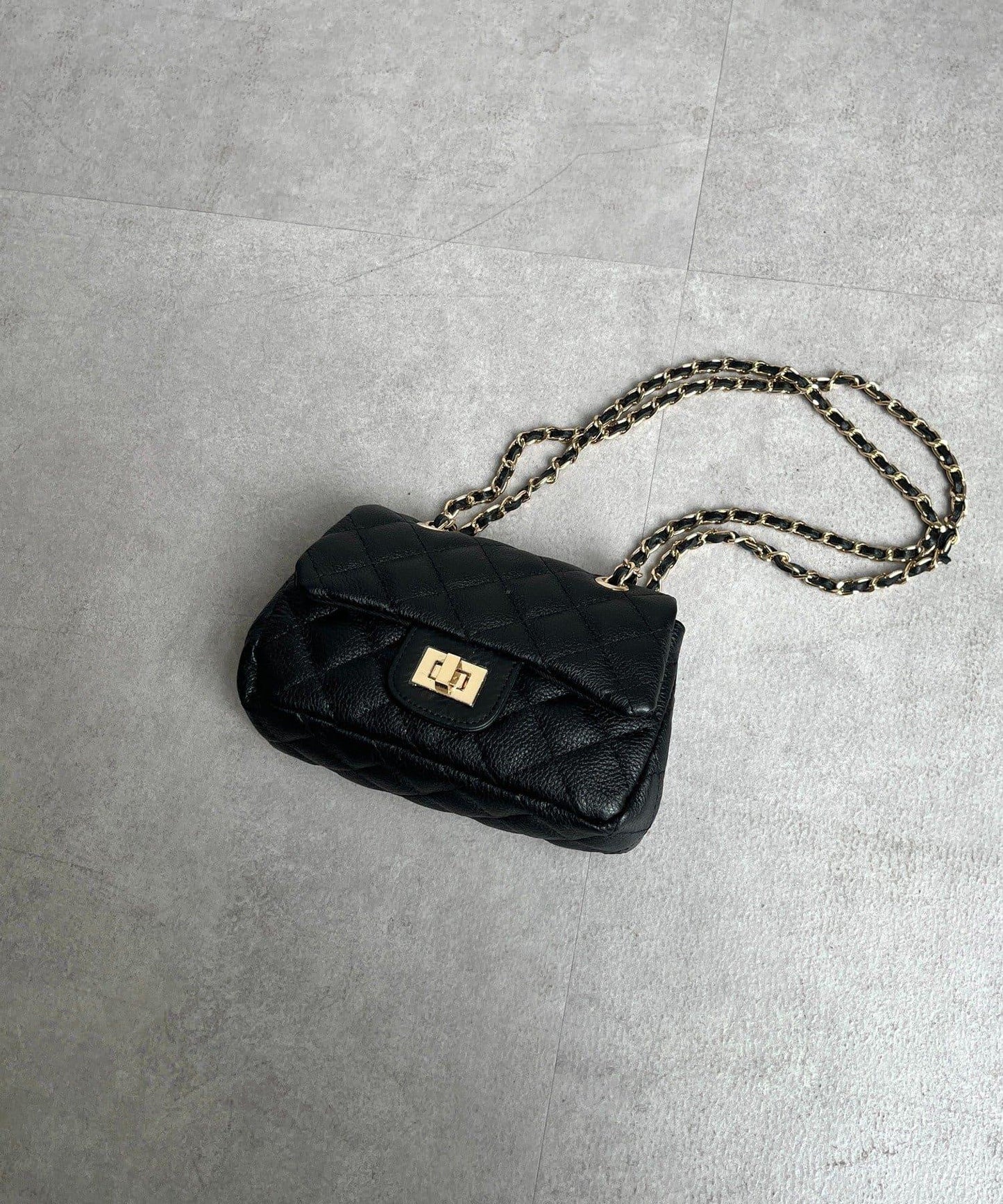 格紋皮革肩揹包