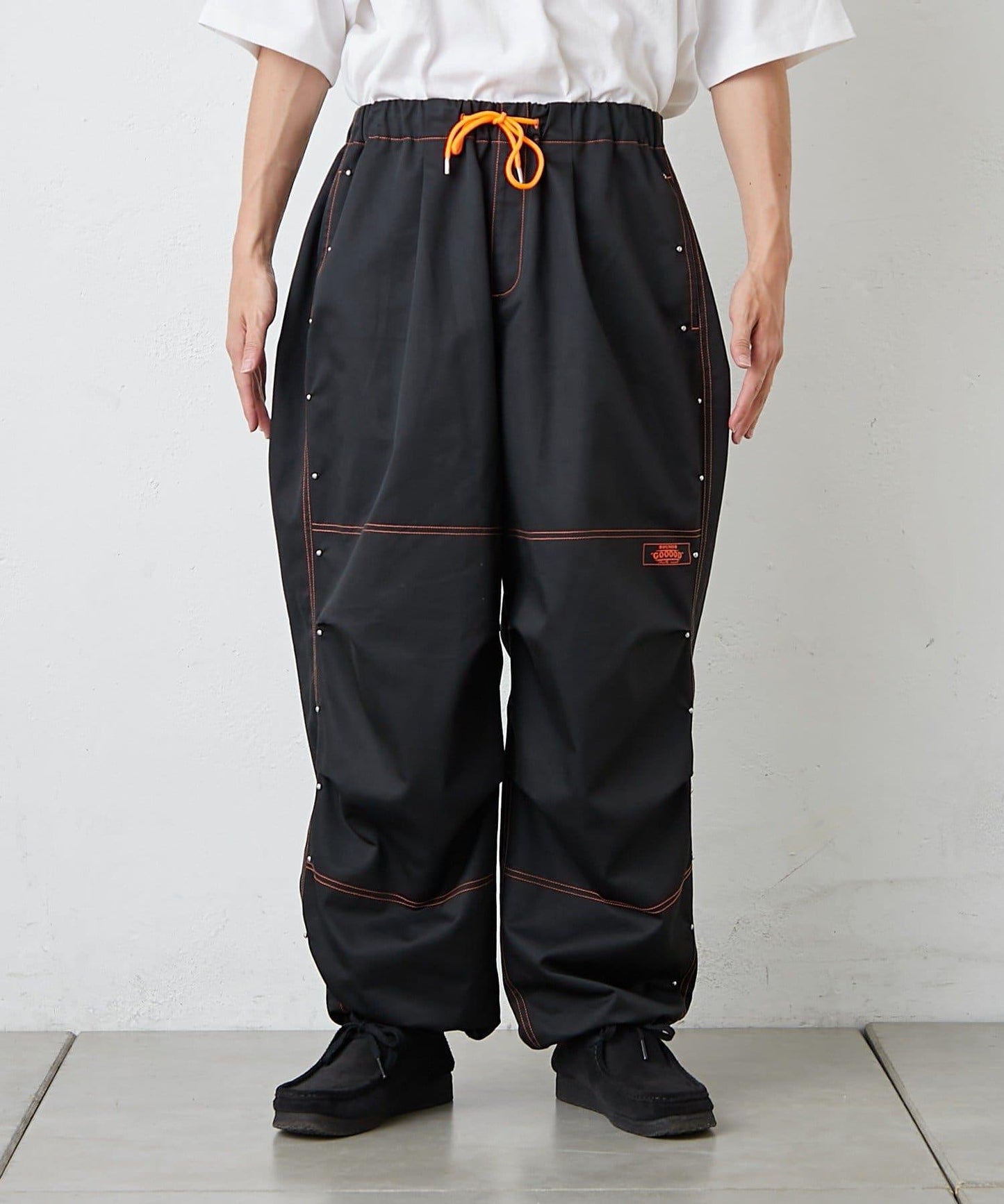 【SG】雙層膝部鉚釘傘布褲