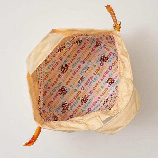 ルッキー 全面刺繡束口手提包