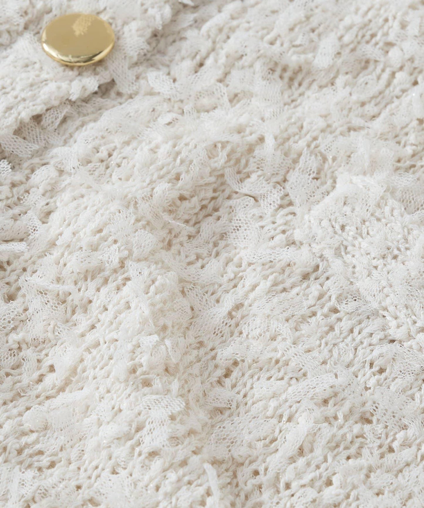 適合打造輕盈造型的亮片薄紗帶紗線金色紐扣開衫