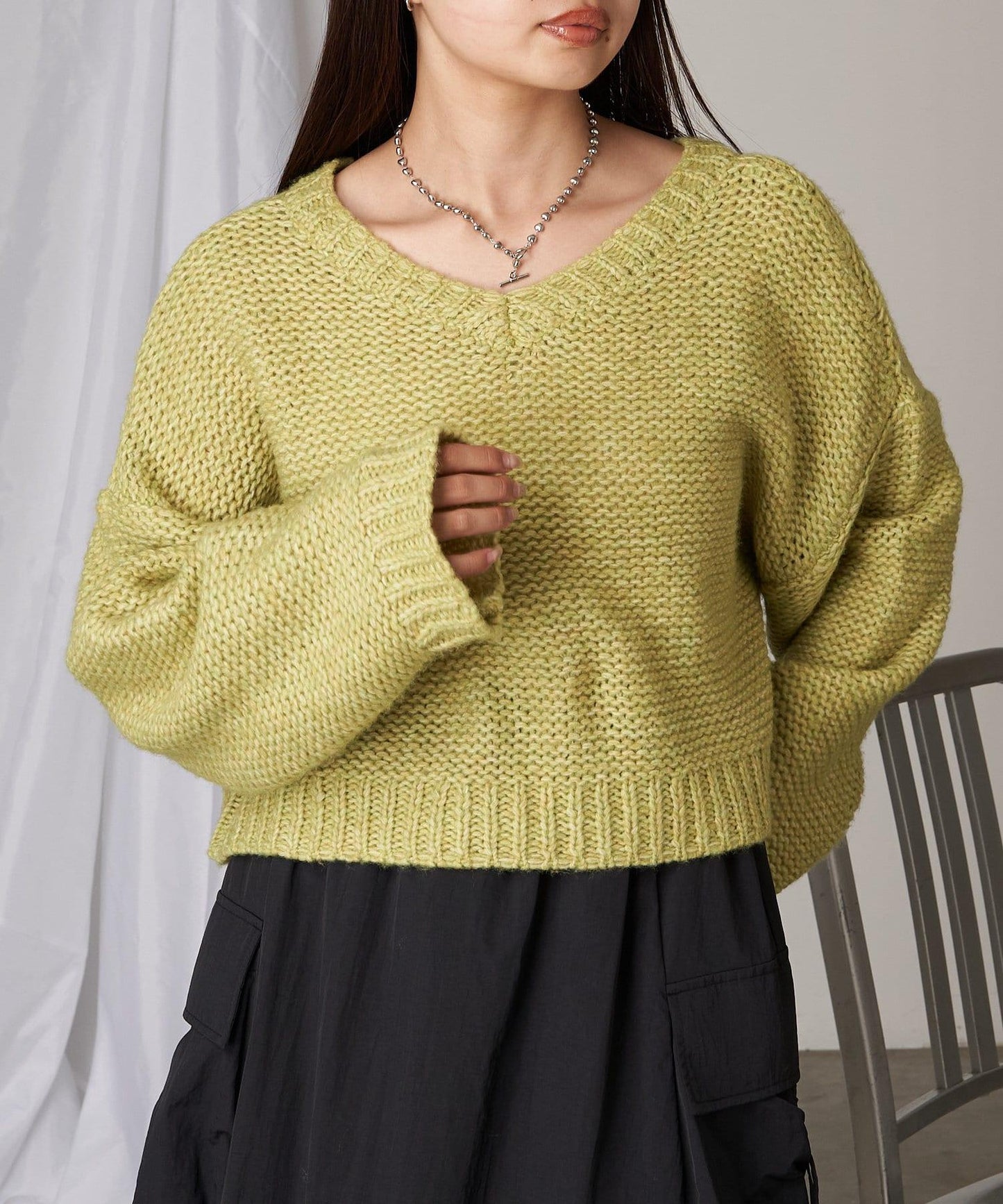 前後兩穿字母刺繡寬鬆短款針織衫