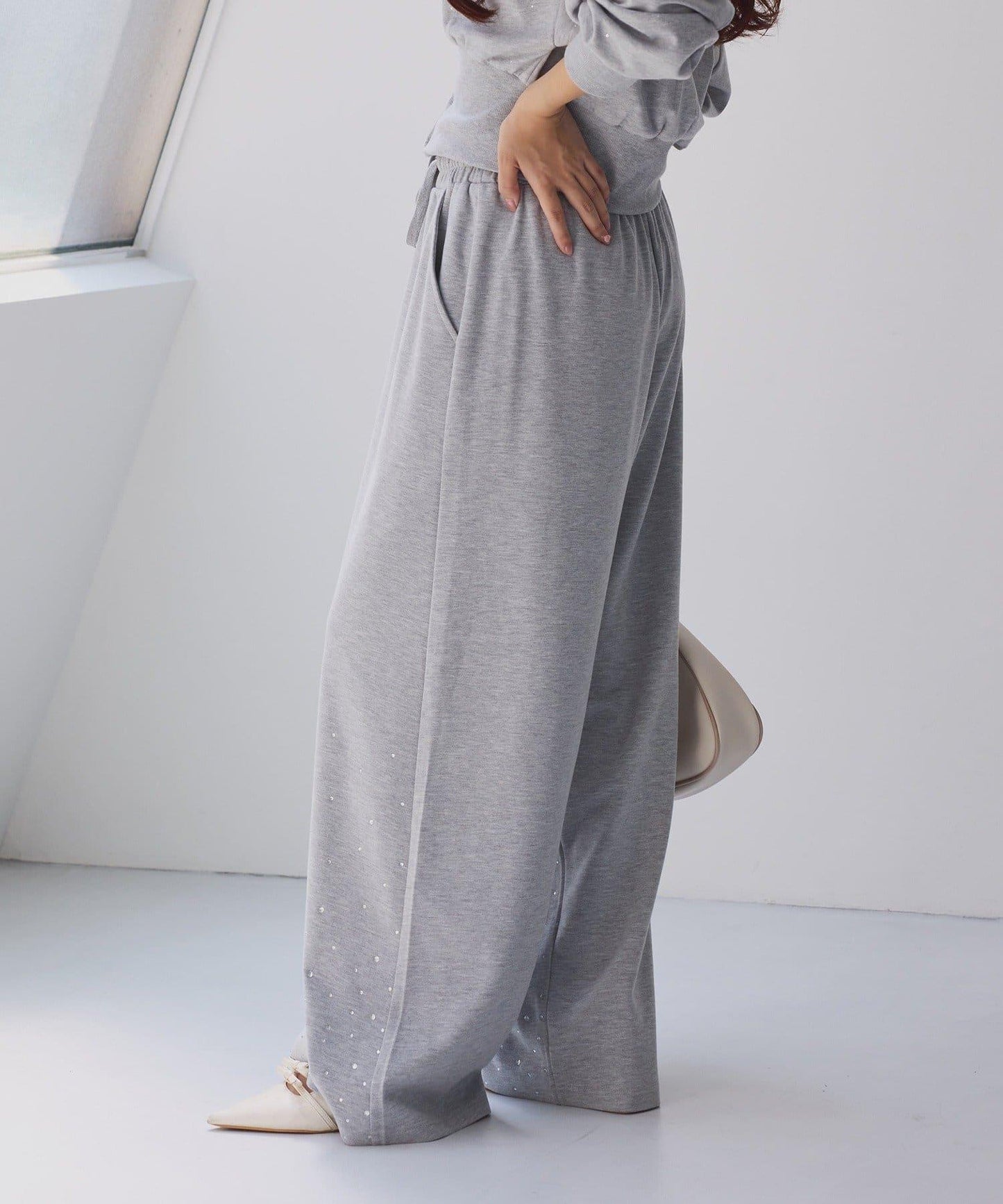 下襬珠飾剪裁褲