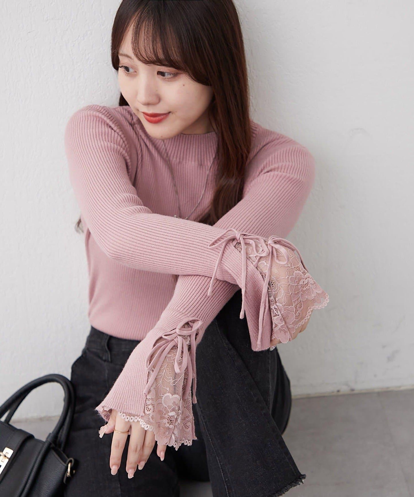 袖部蕾絲拼接蝴蝶結針織上衣