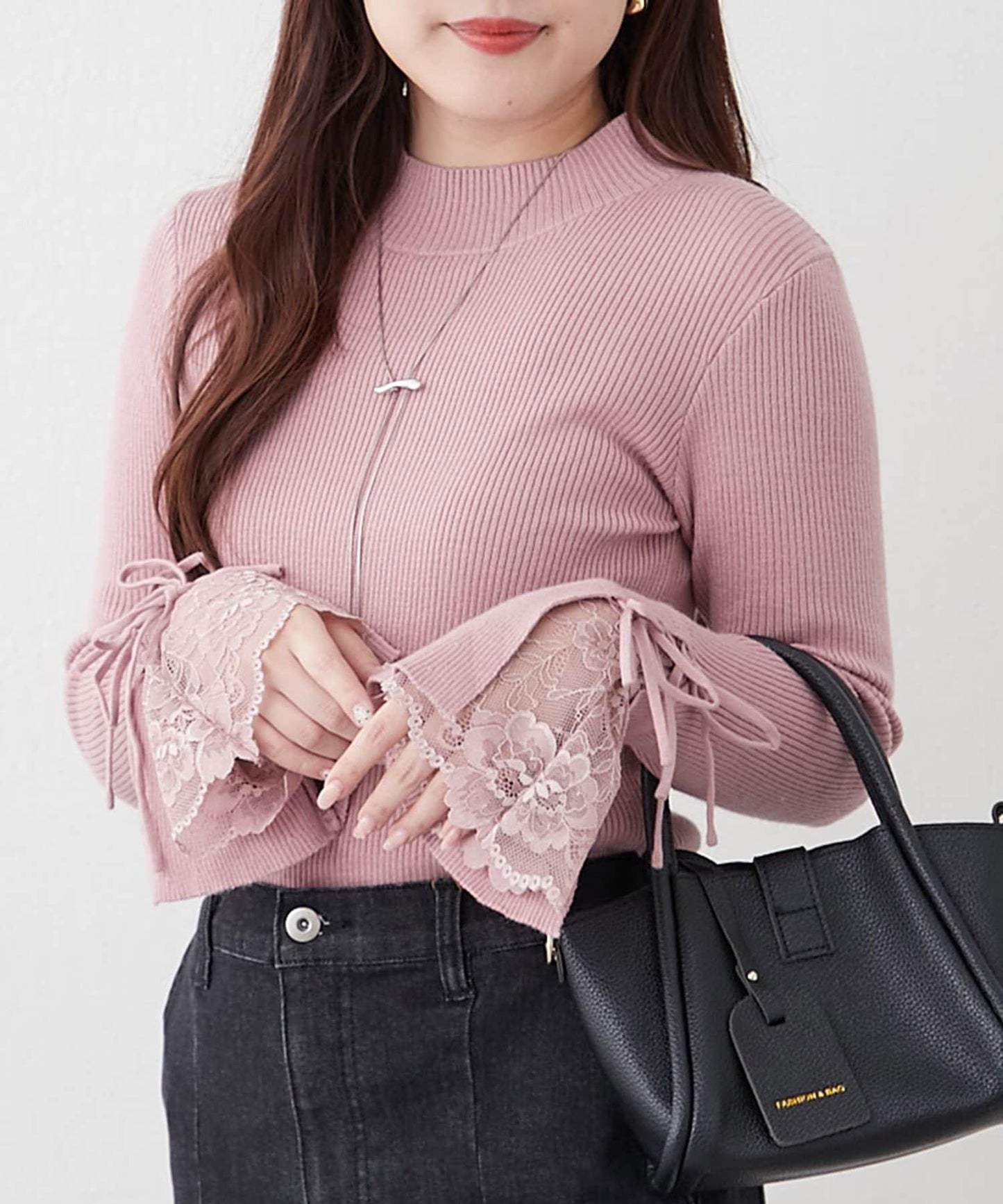 袖部蕾絲拼接蝴蝶結針織上衣