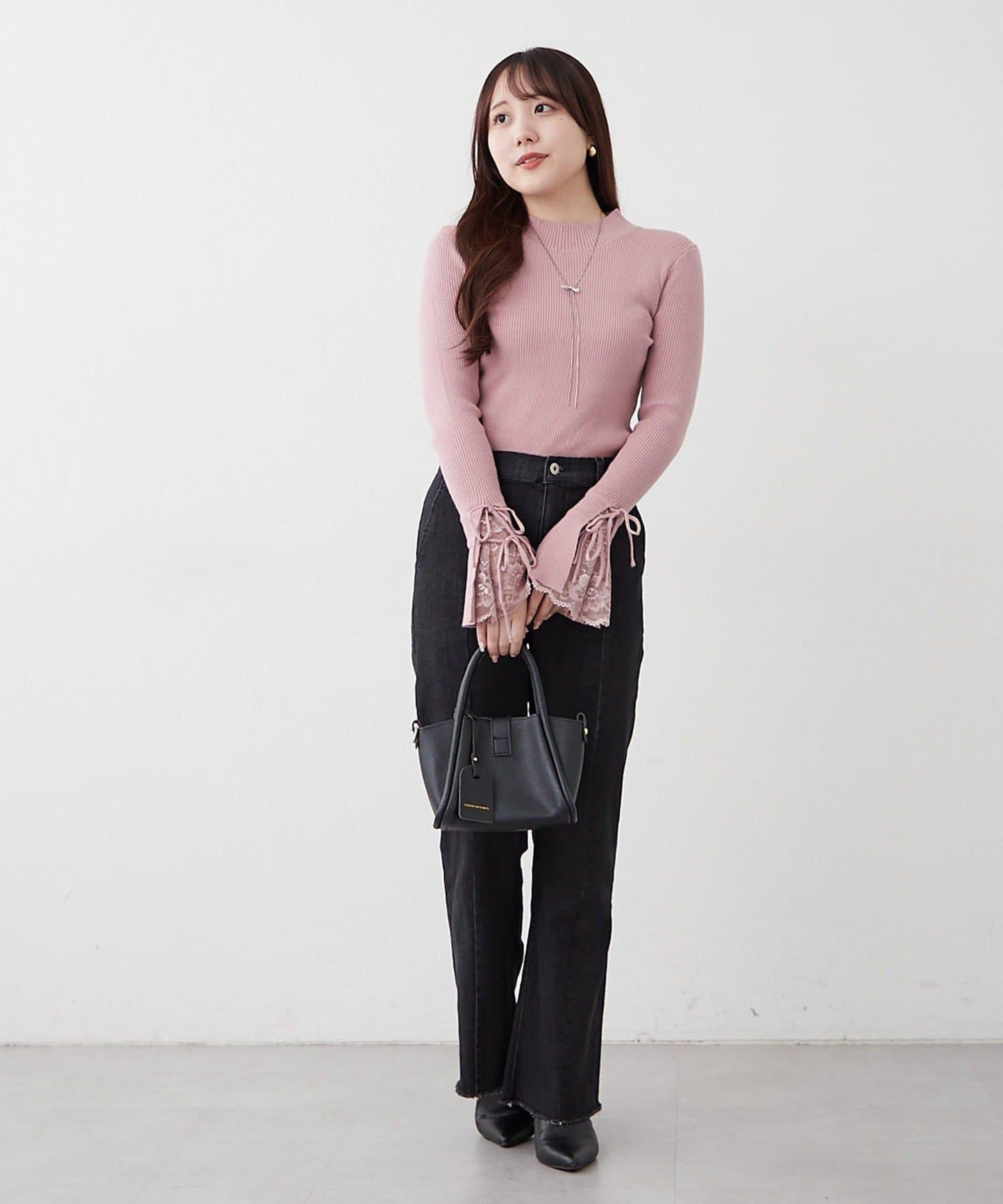 袖部蕾絲拼接蝴蝶結針織上衣