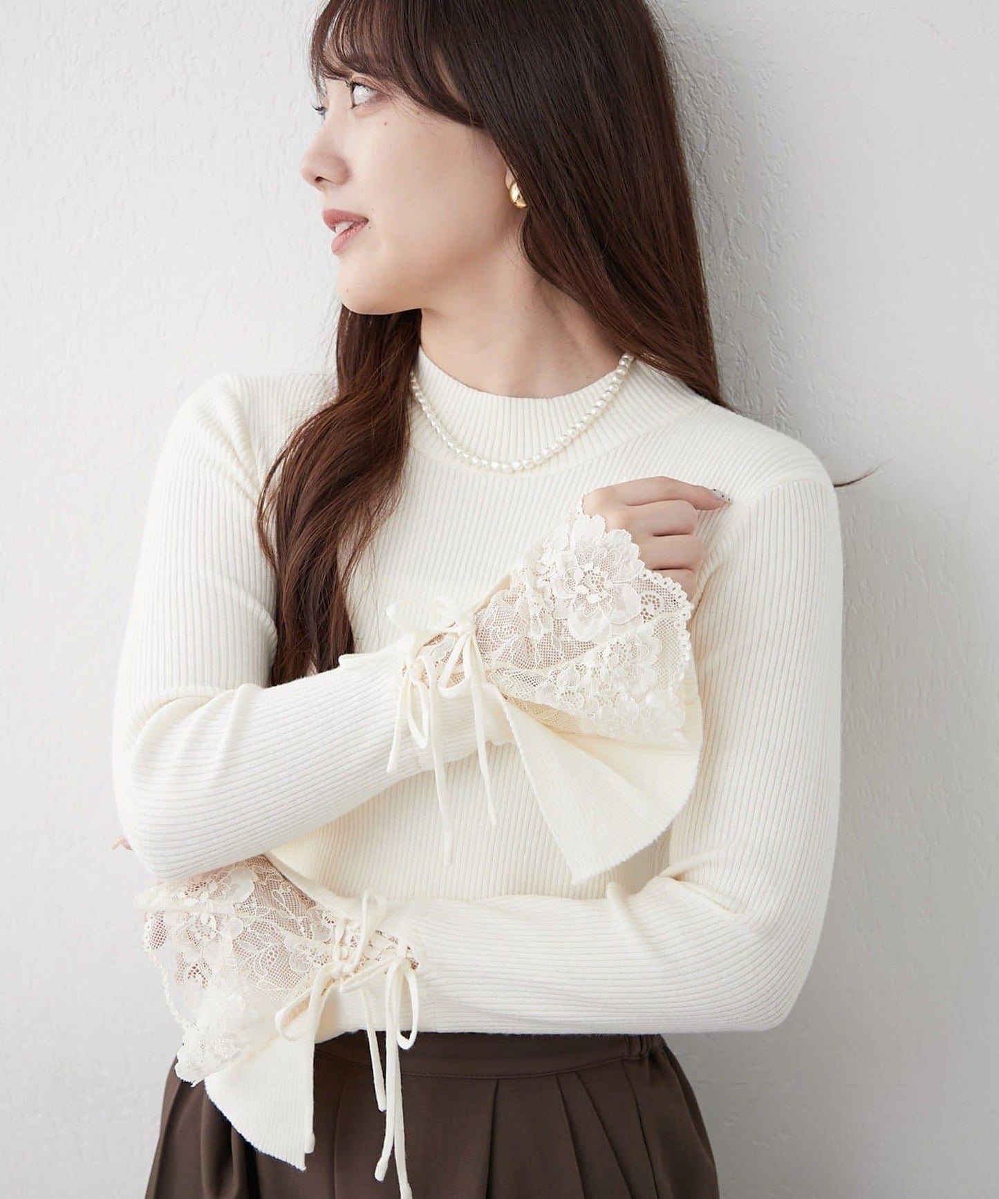 袖部蕾絲拼接蝴蝶結針織上衣