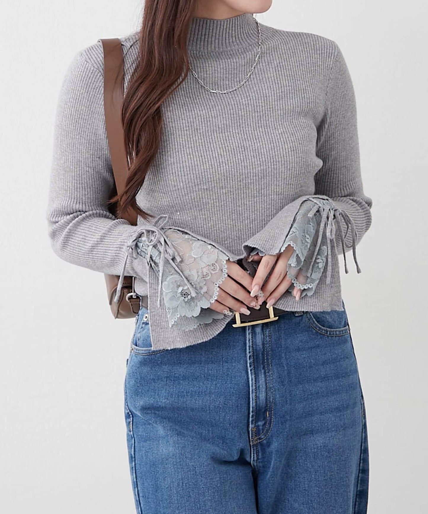 袖部蕾絲拼接蝴蝶結針織上衣