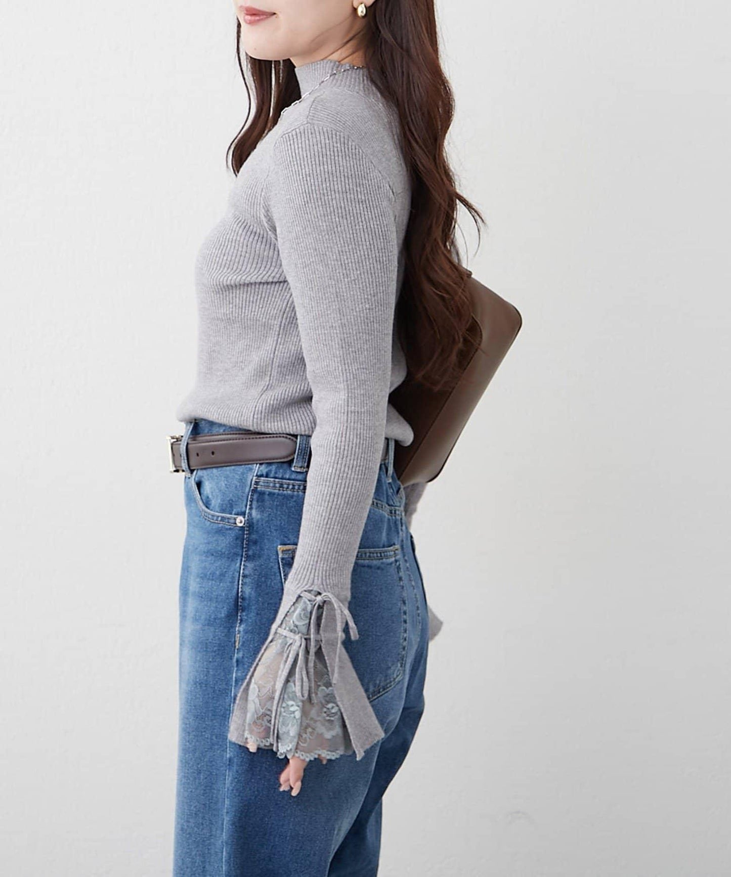 袖部蕾絲拼接蝴蝶結針織上衣