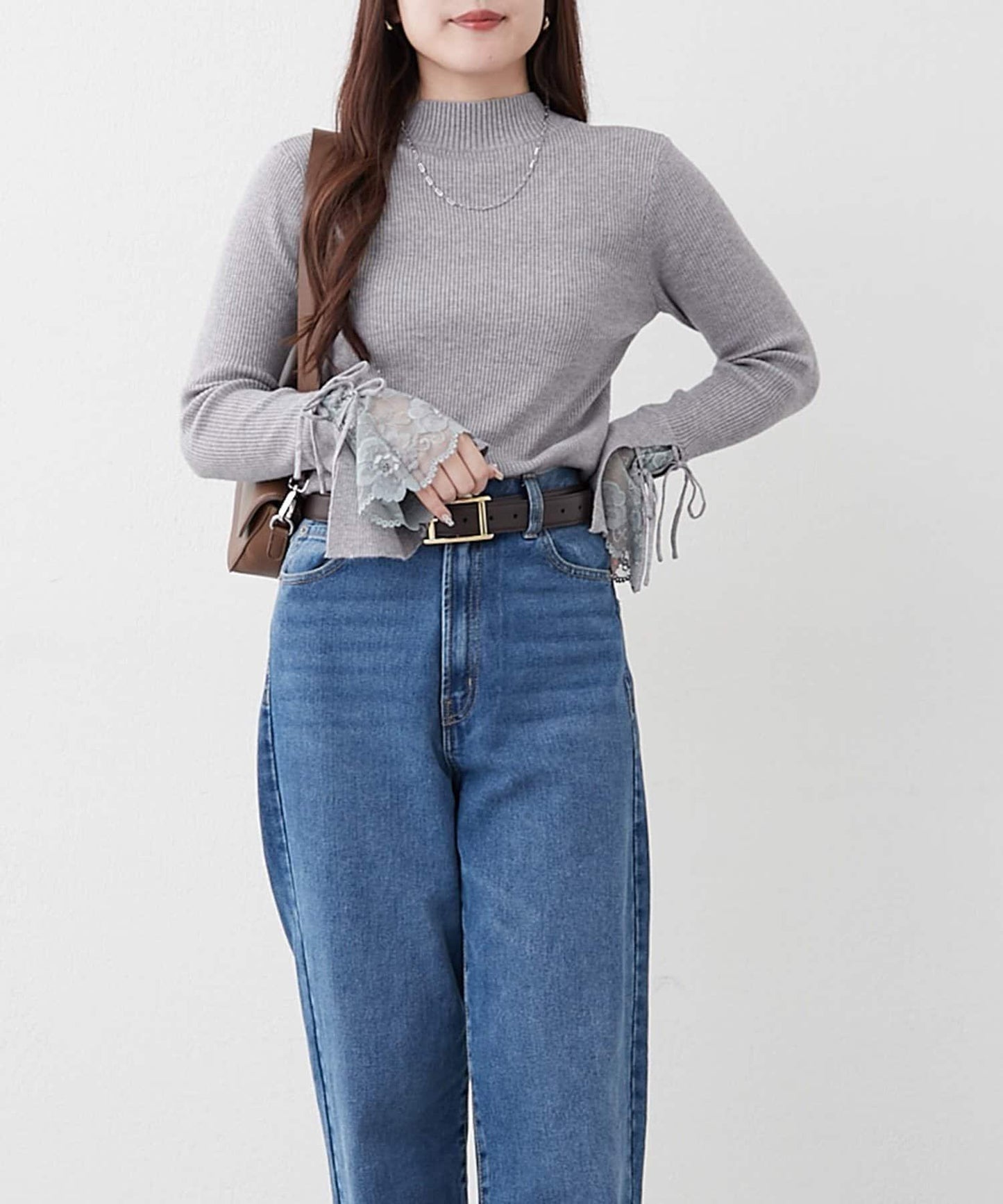 袖部蕾絲拼接蝴蝶結針織上衣