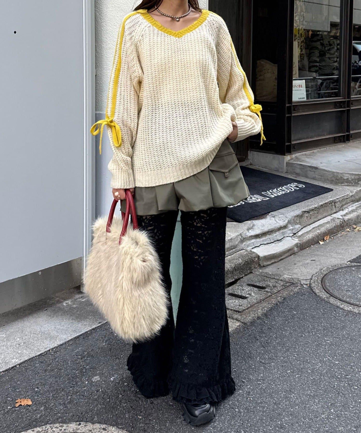 袖部條紋蝴蝶結插肩袖針織衫