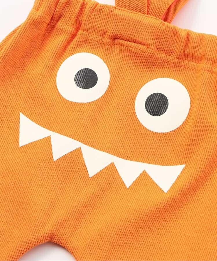 帶吊帶卡通臉圖案打底褲