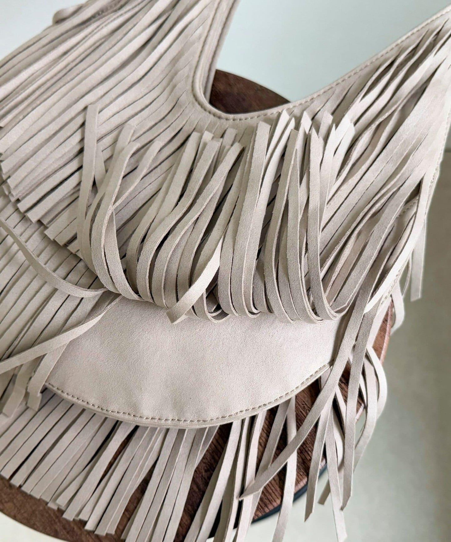 麂皮流蘇圓形包