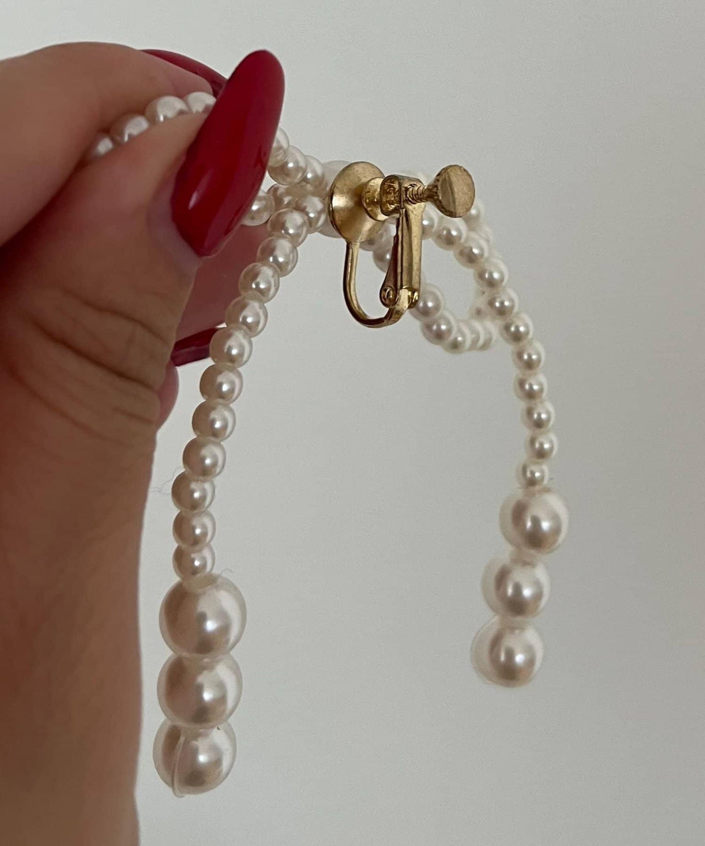 珍珠蝴蝶結耳環