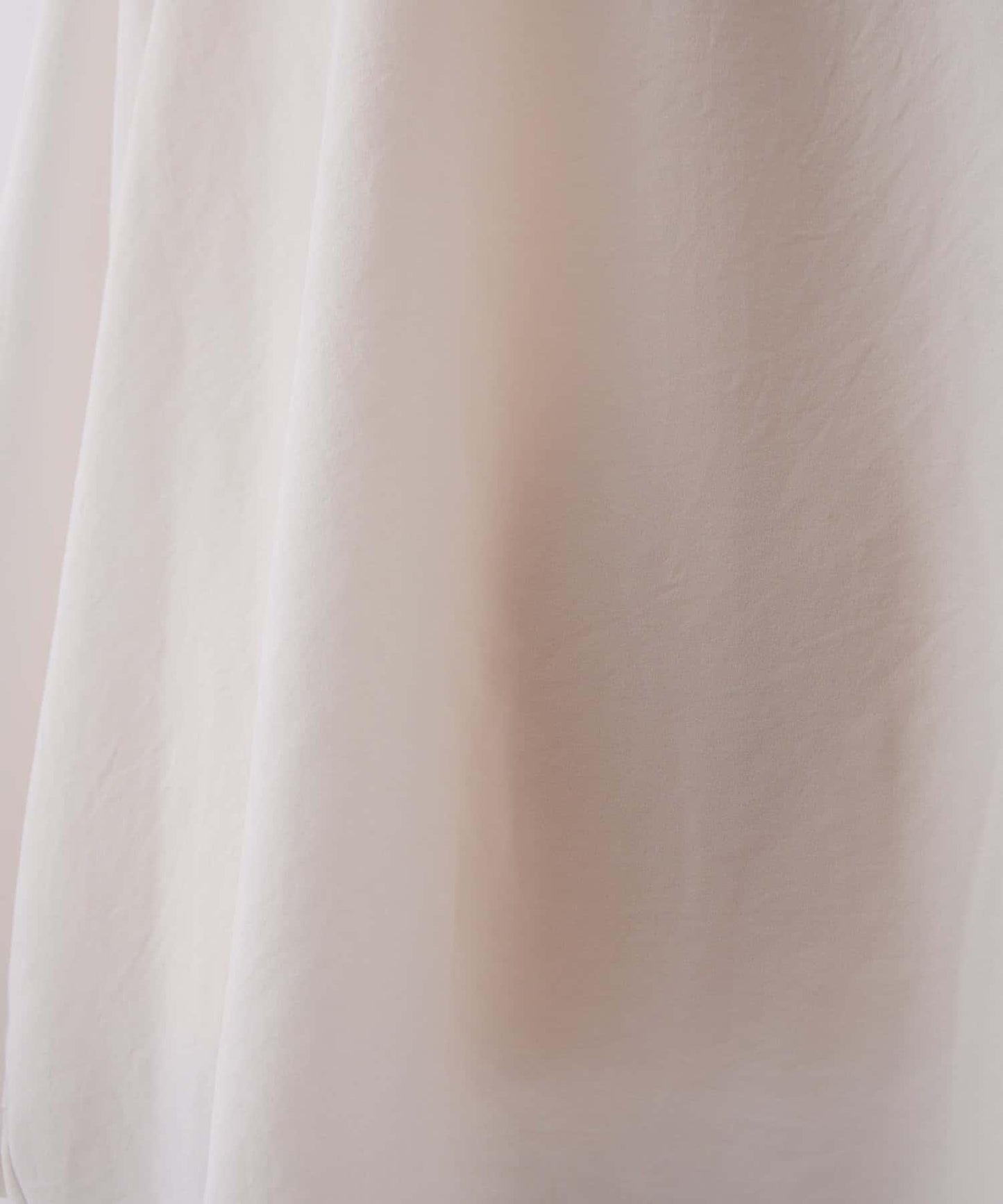 後背垂墜T恤襯衫