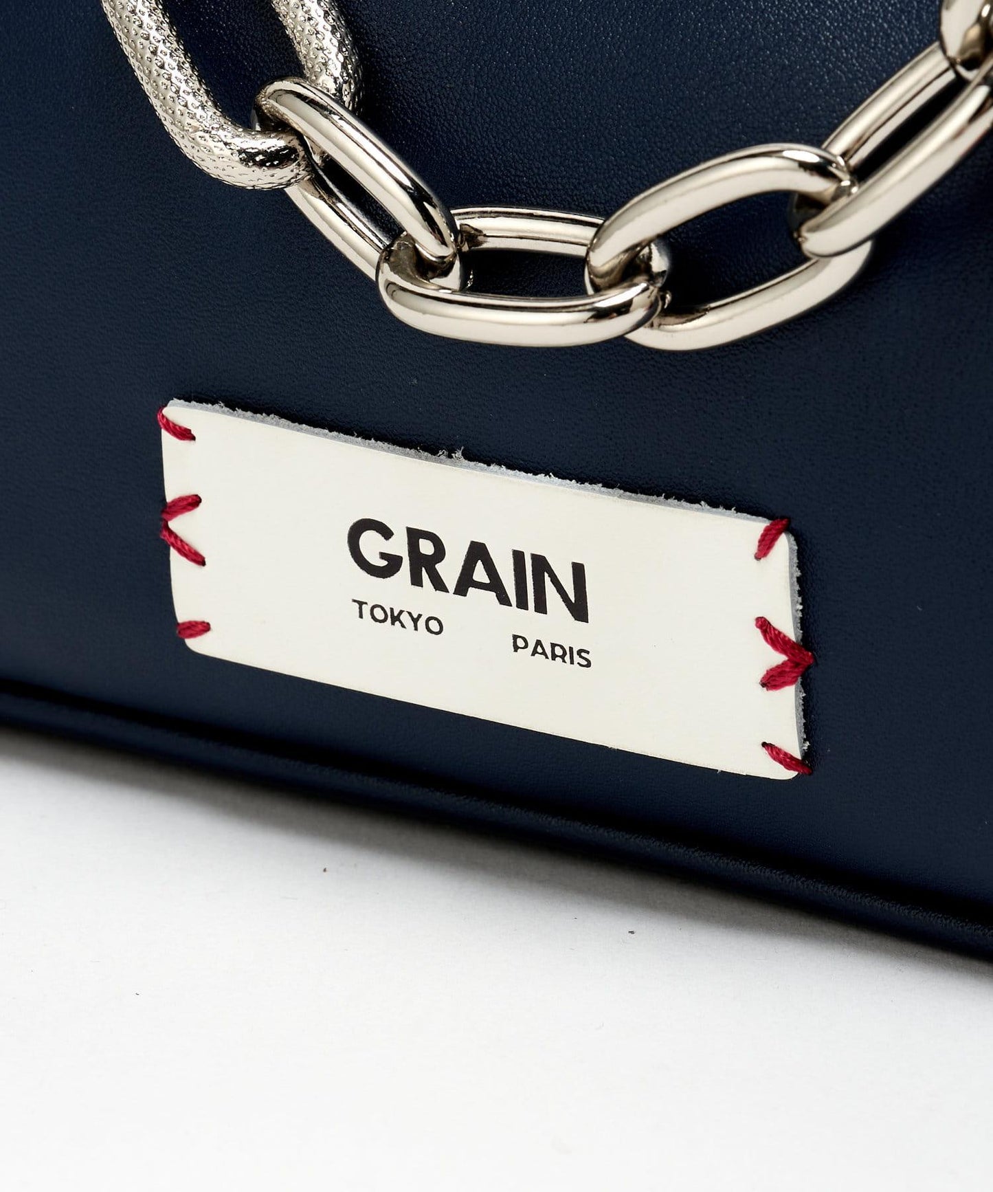 【GRAIN/穀物】帶吊墜的雙色手提包