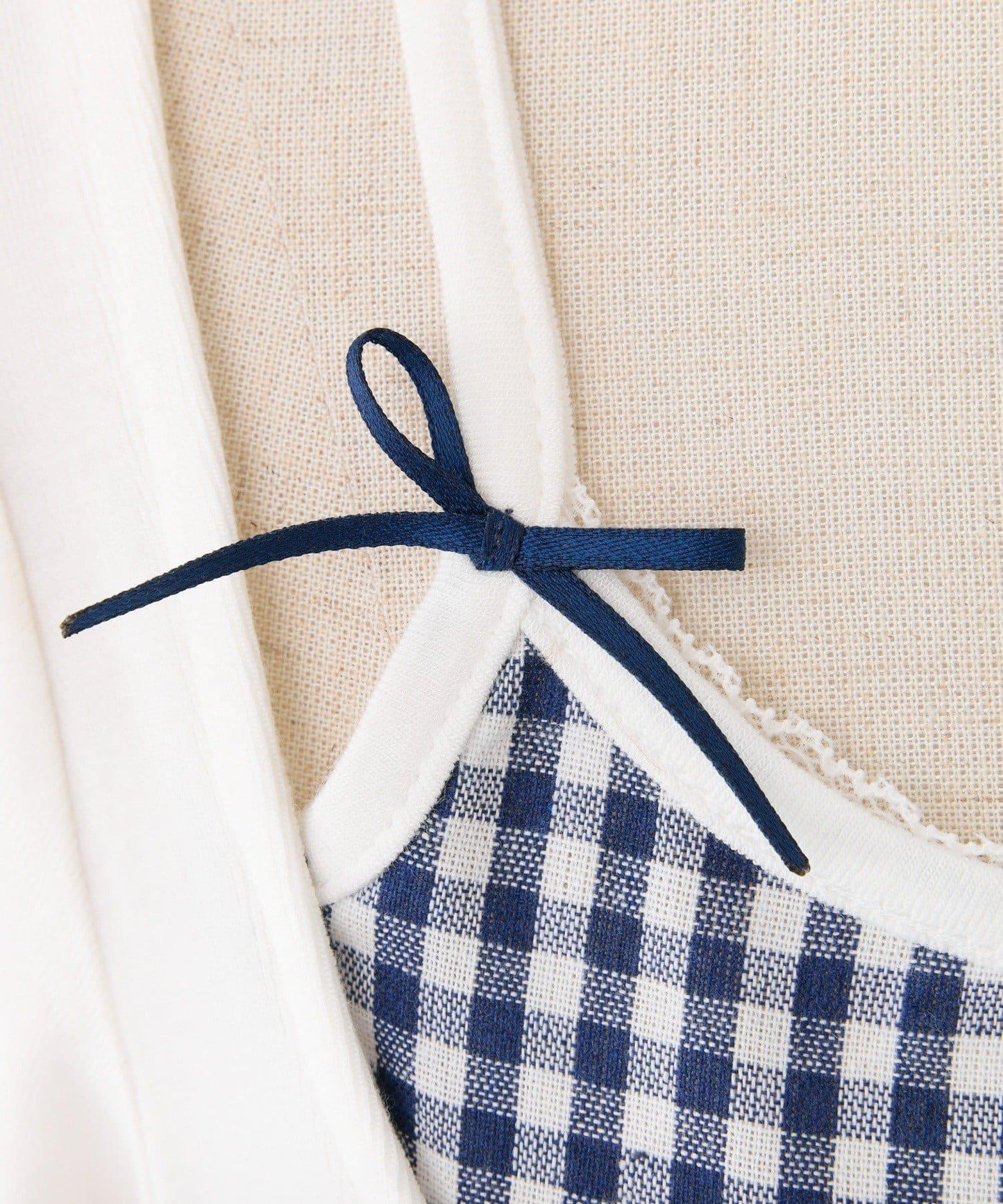 【一件接一件】層疊風帶蝴蝶結上衣