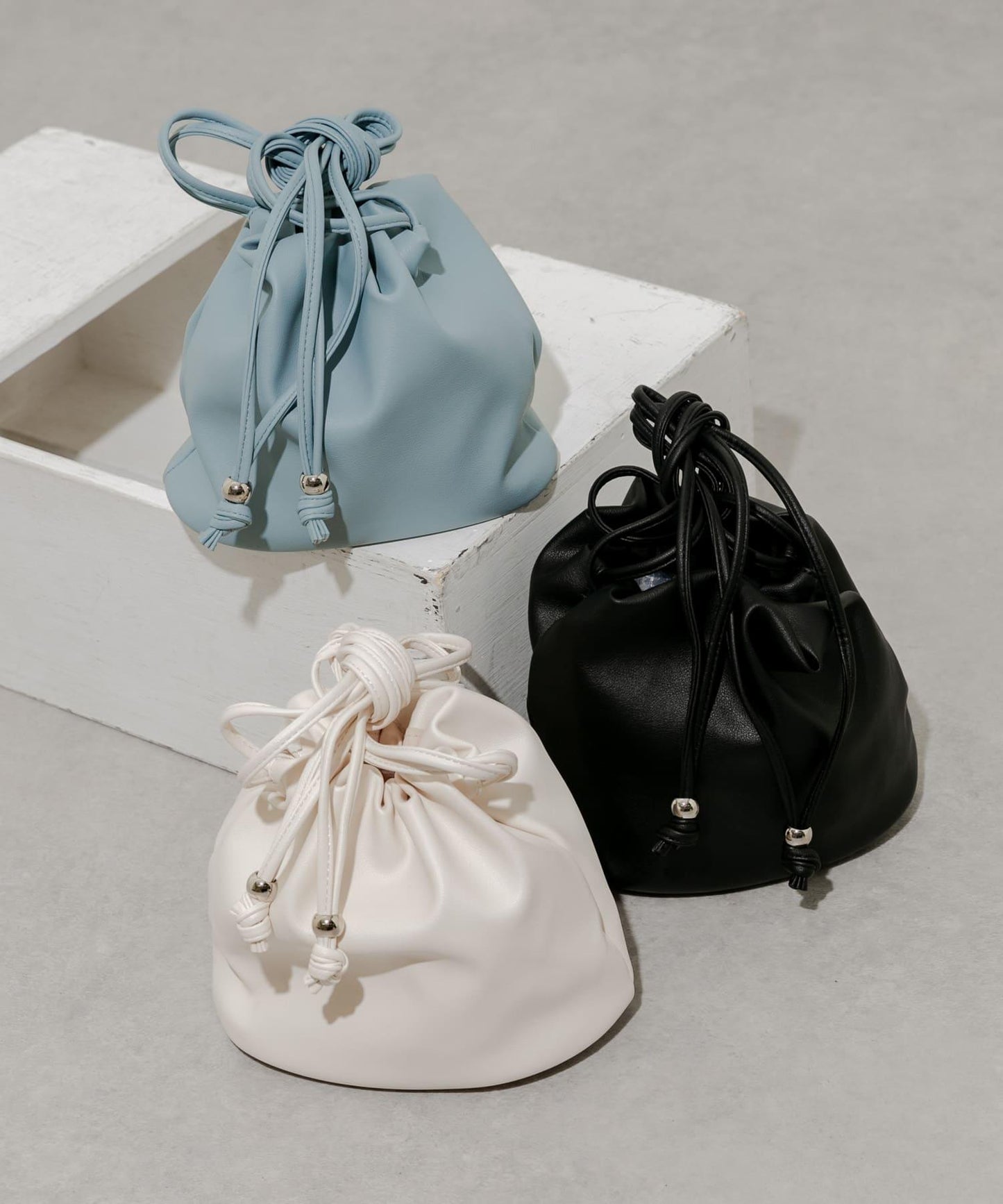 圓形束口單肩包