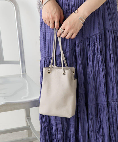 真皮迷你寬口袋包