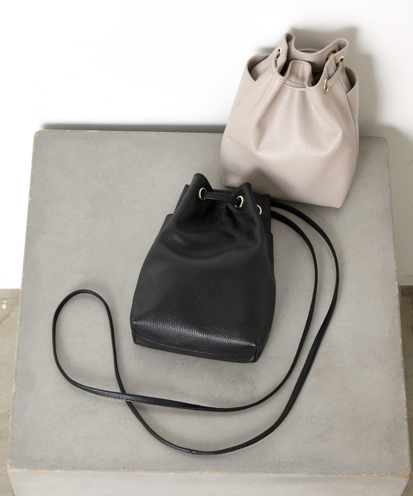 真皮迷你寬口袋包