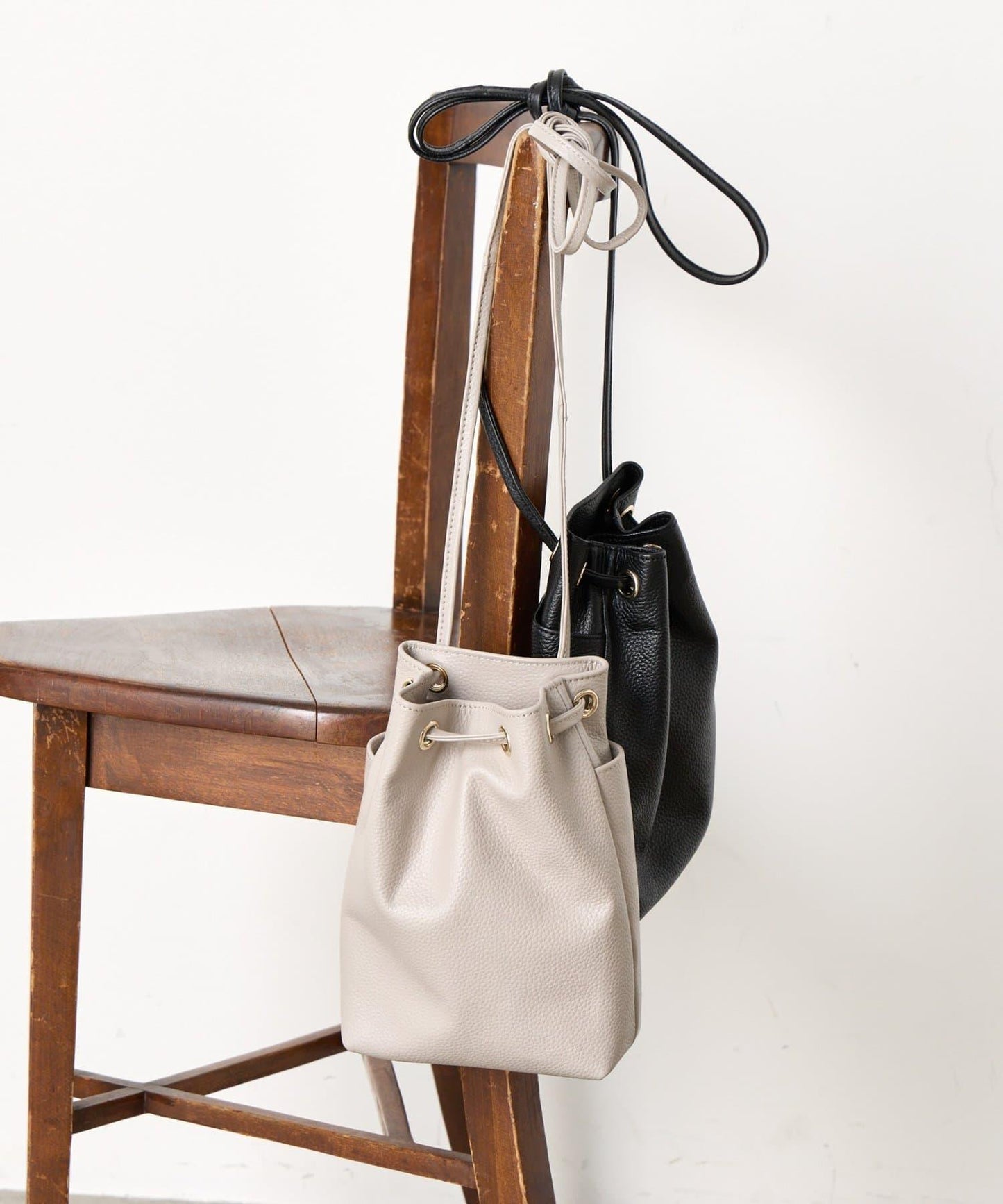 真皮迷你寬口袋包