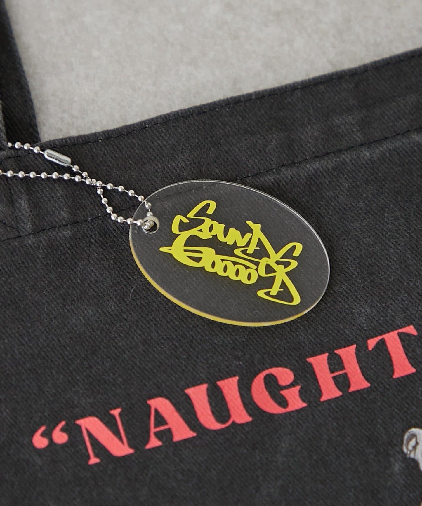 【SOUNDSGOOOOD】犬印花掛飾帶手提包