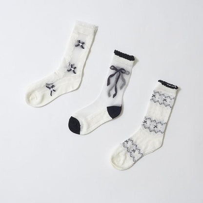 黑白色系透膚高筒襪