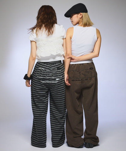 【OddStudio】ピグメントバックダメージロゴスウェットパンツ