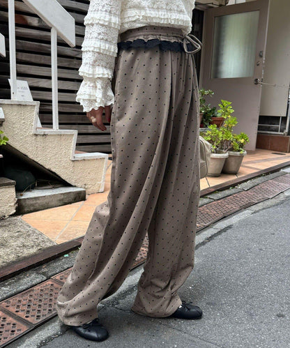 圓點弧線運動褲