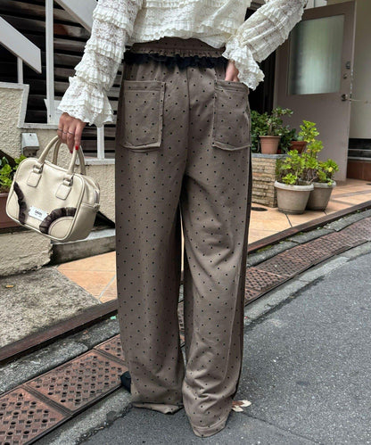 圓點弧線運動褲