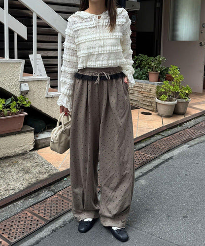 圓點弧線運動褲