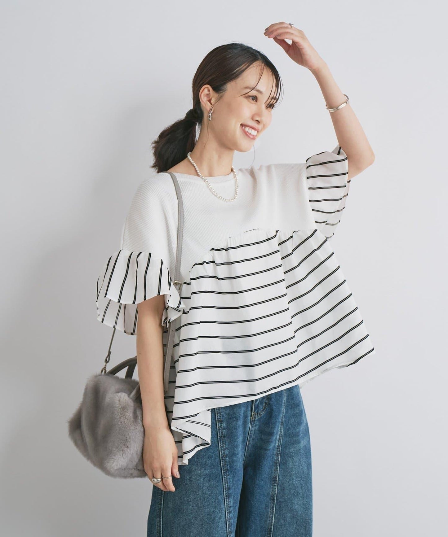 一件穿出時尚感針織拼接提花條紋