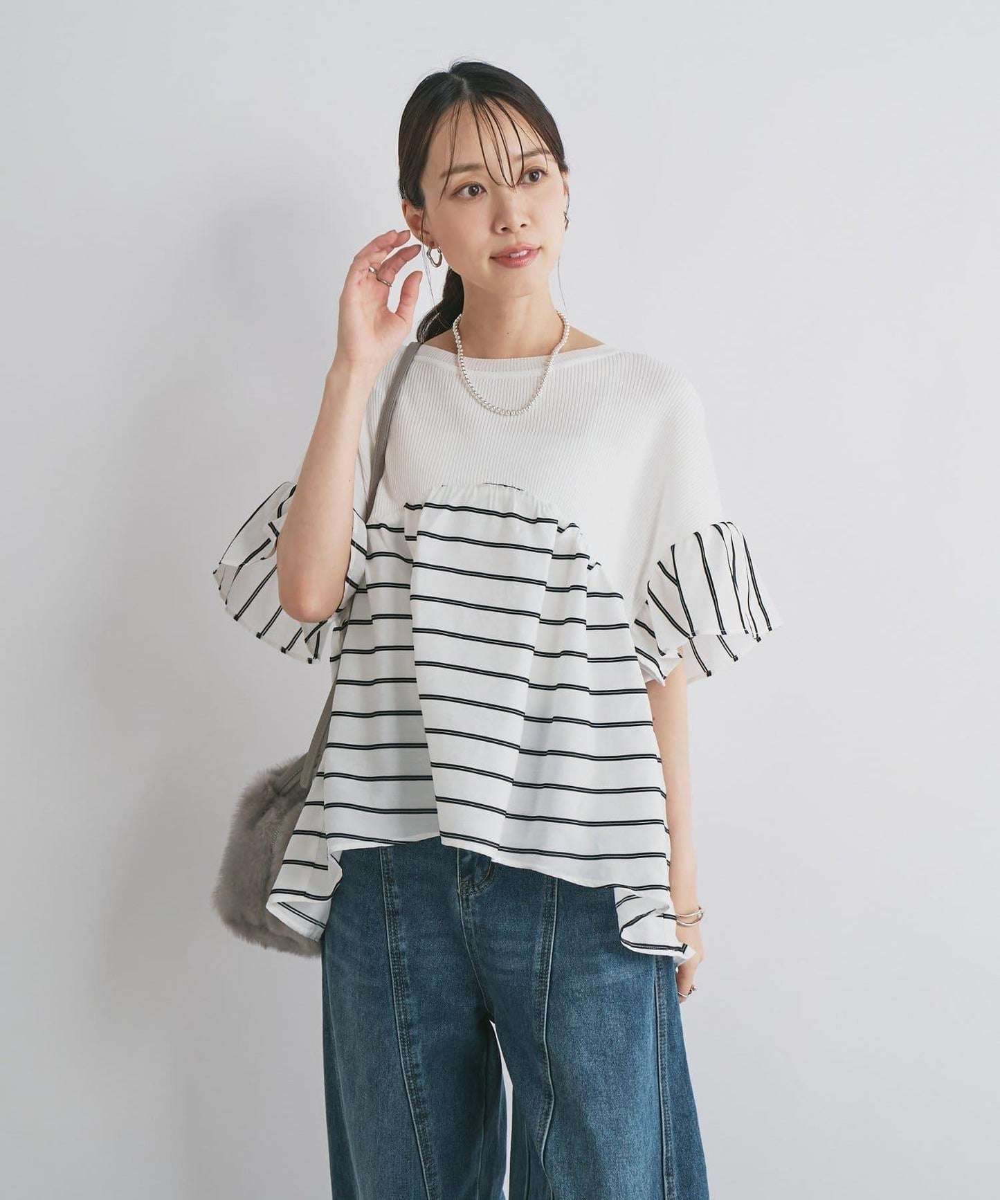 一件穿出時尚感針織拼接提花條紋