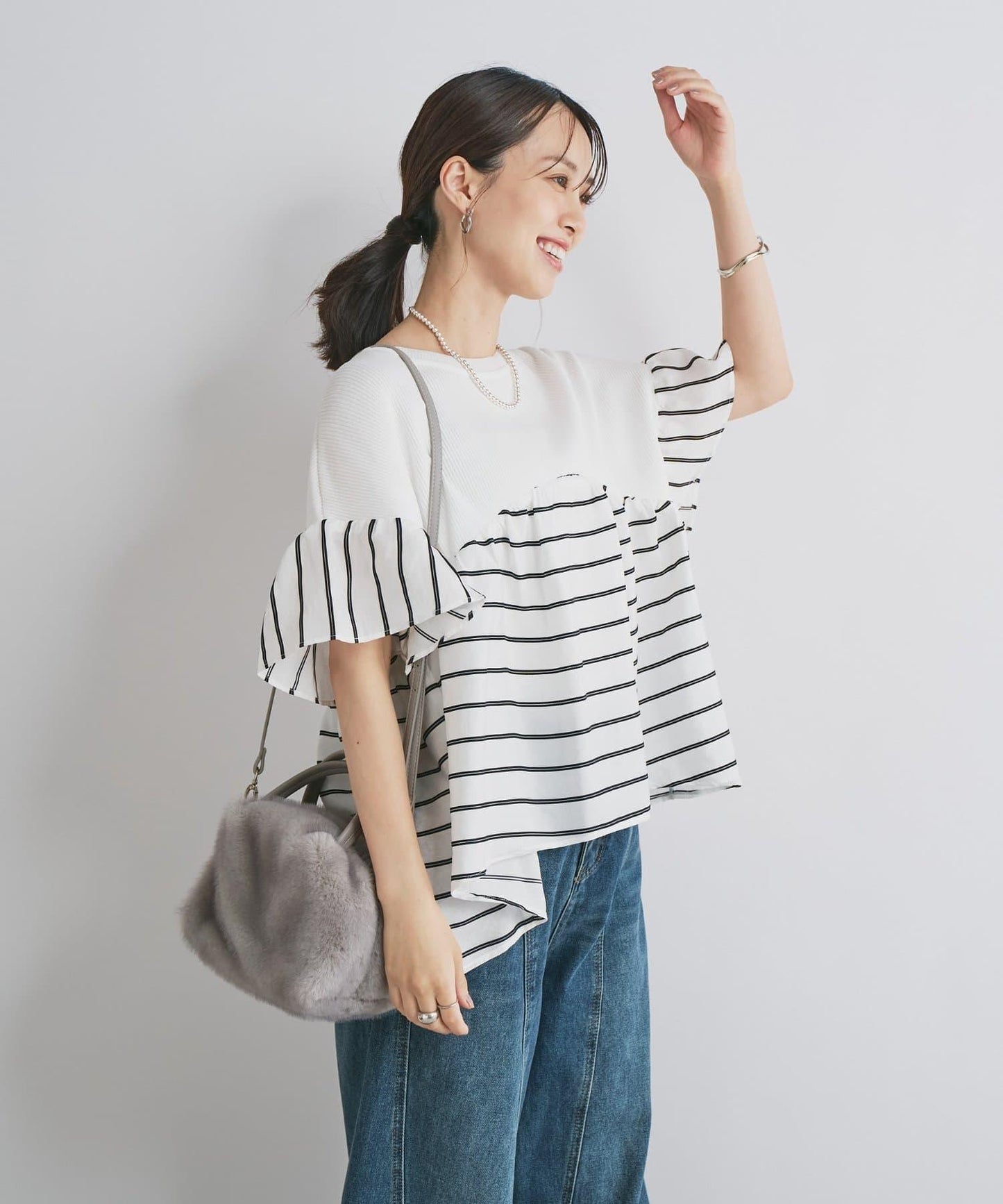 一件穿出時尚感針織拼接提花條紋