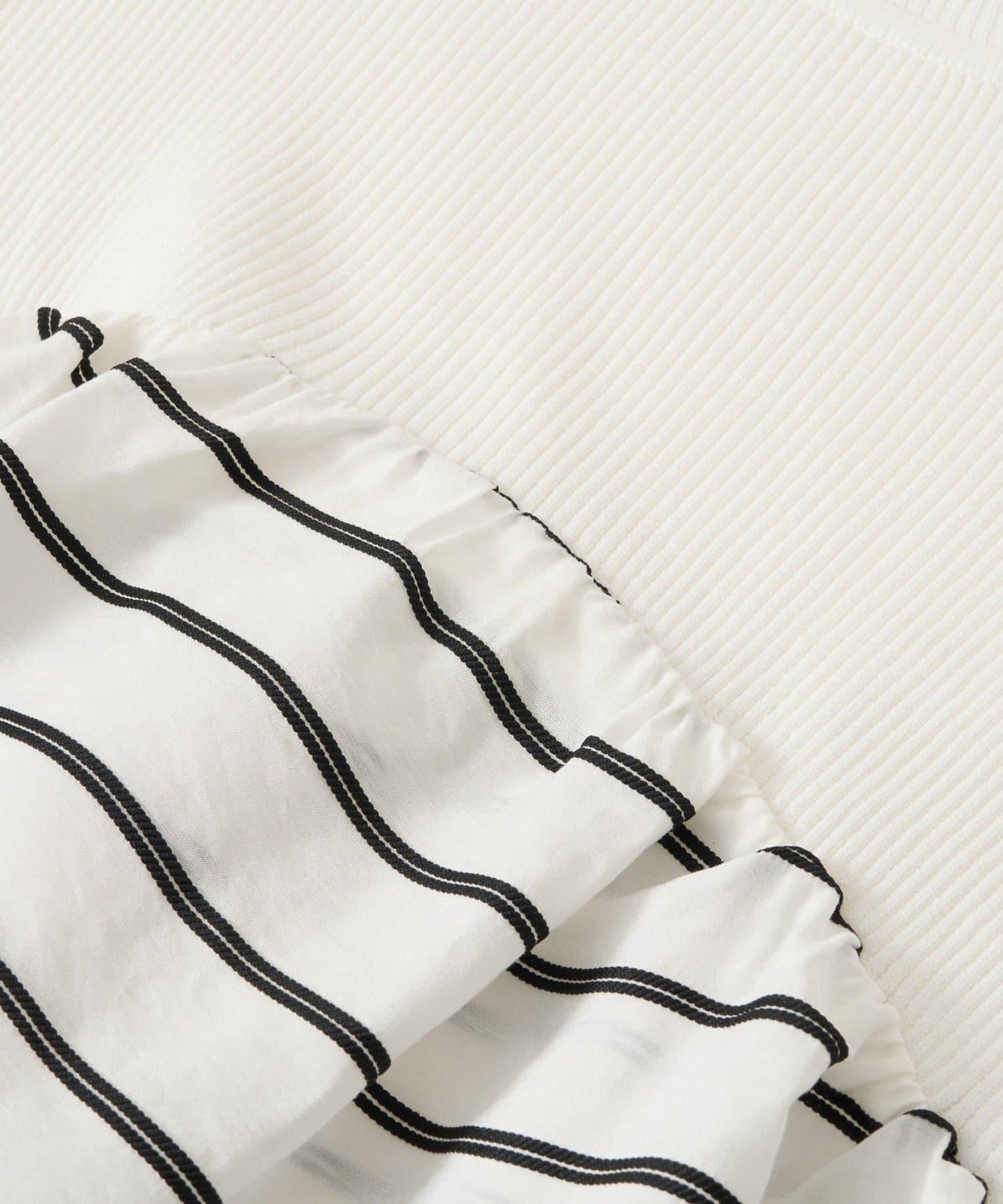 一件穿出時尚感針織拼接提花條紋