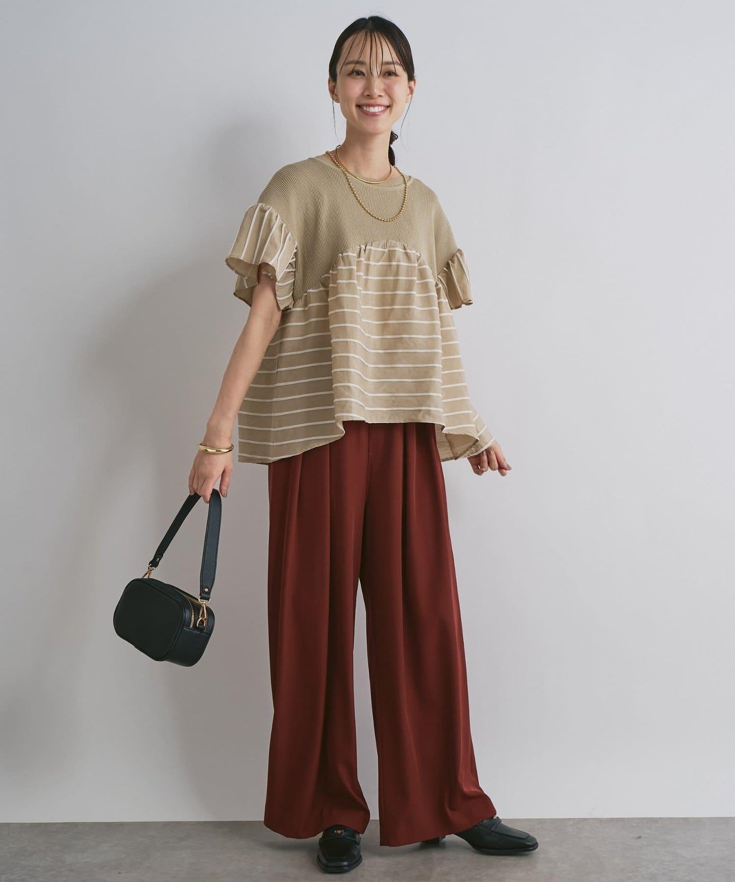 一件穿出時尚感針織拼接提花條紋