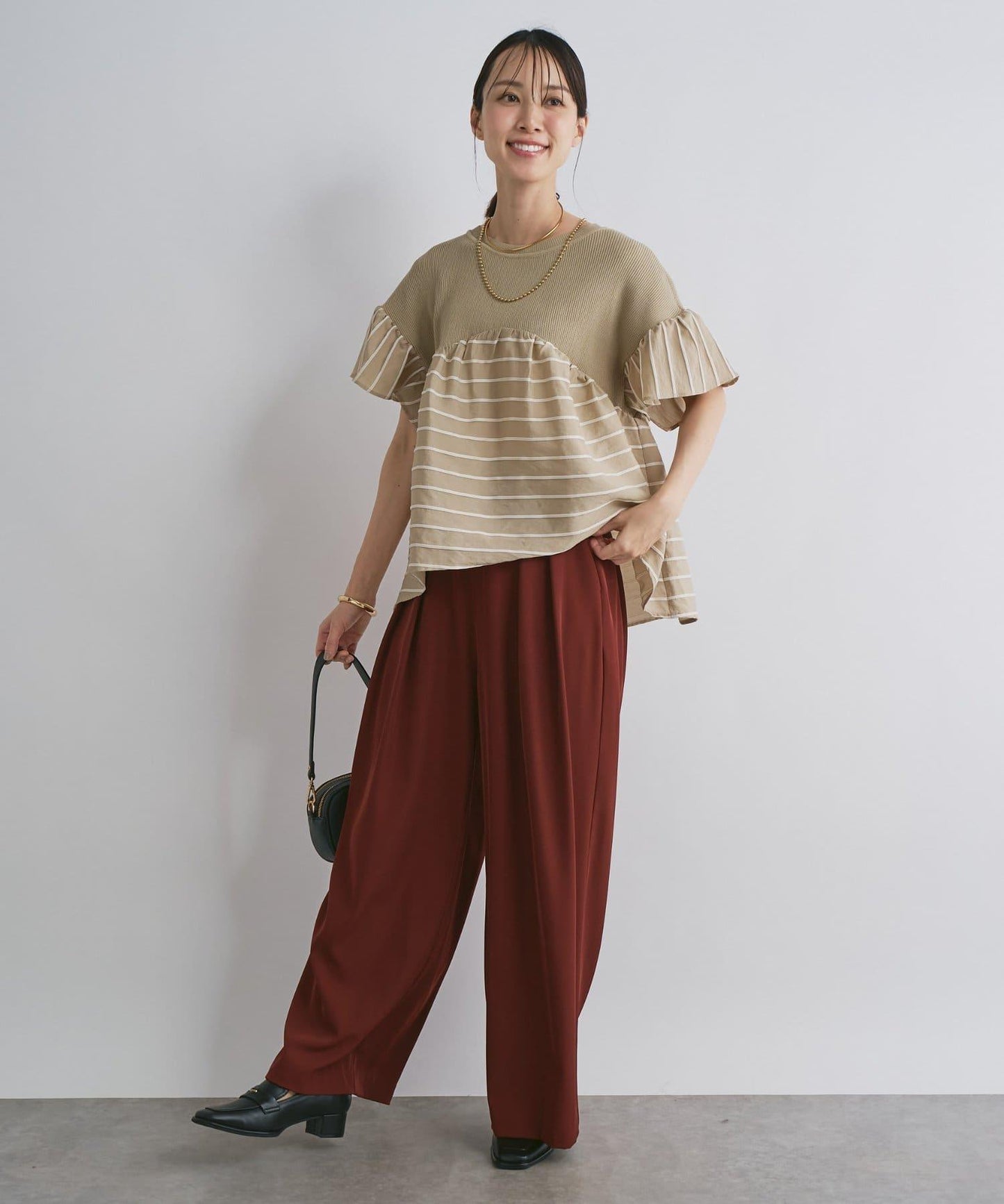 一件穿出時尚感針織拼接提花條紋