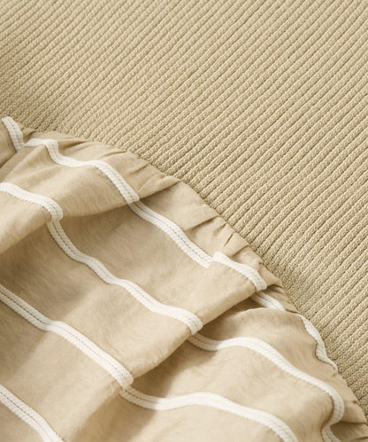 一件穿出時尚感針織拼接提花條紋