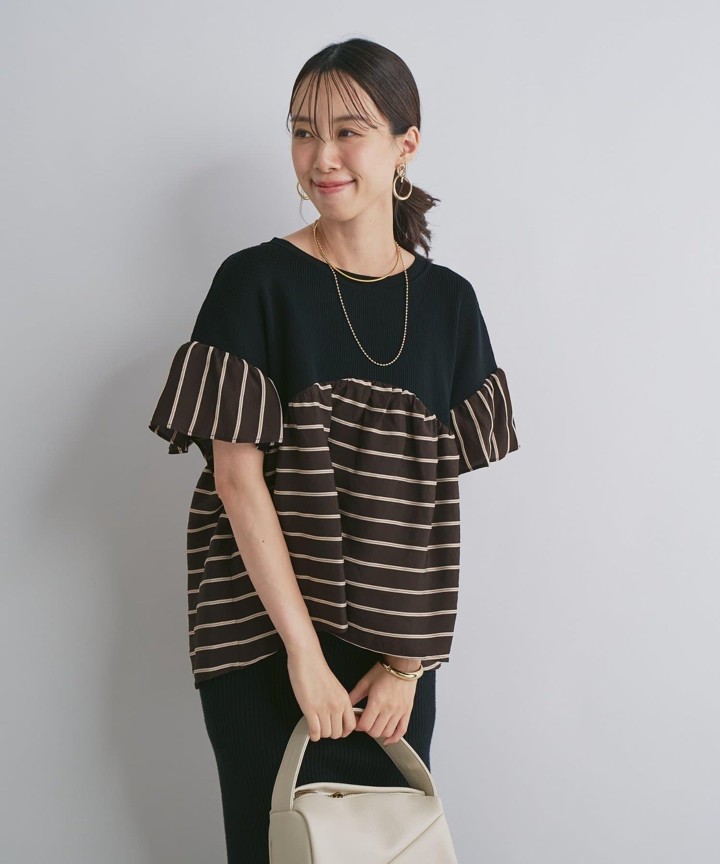 一件穿出時尚感針織拼接提花條紋