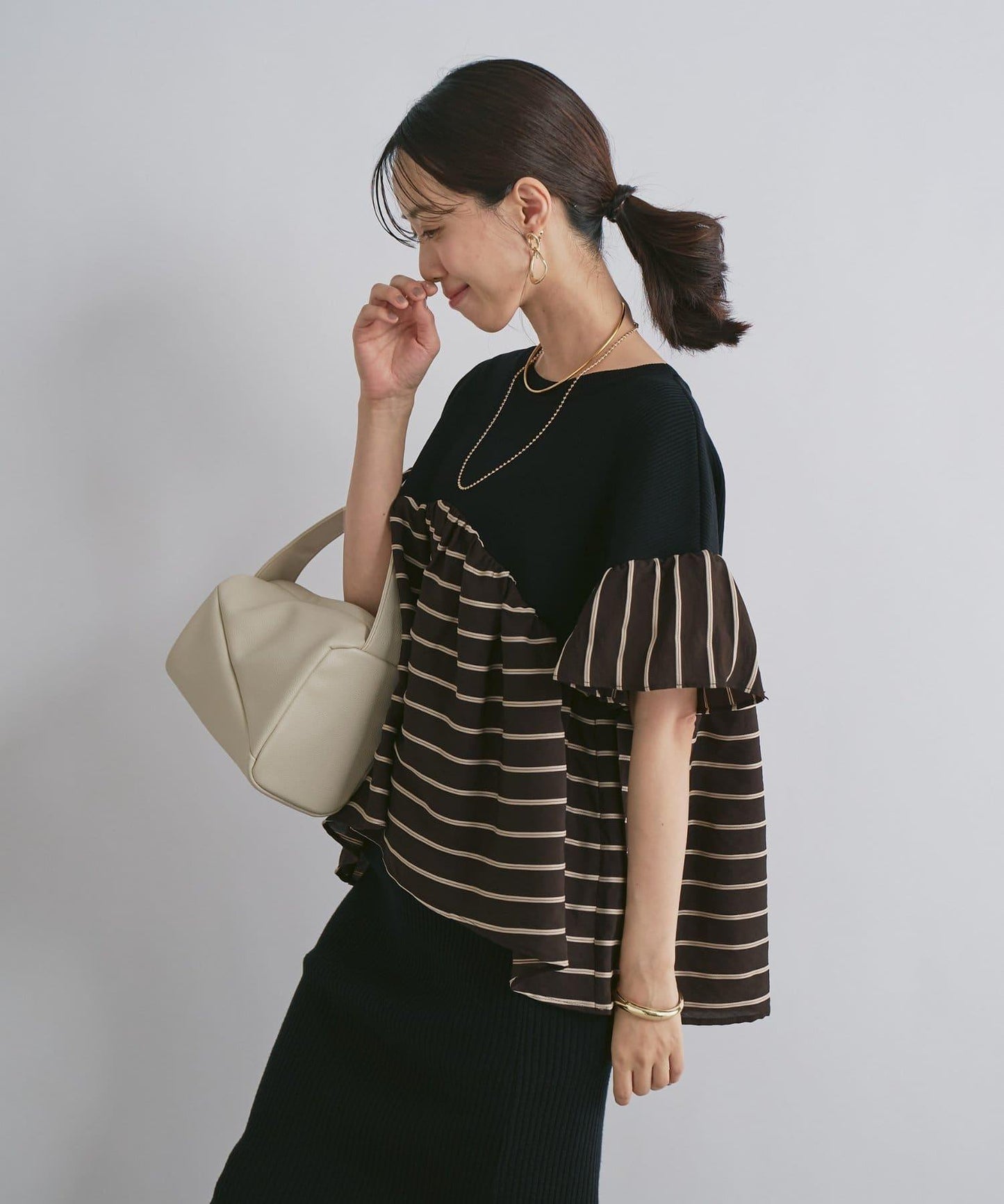 一件穿出時尚感針織拼接提花條紋