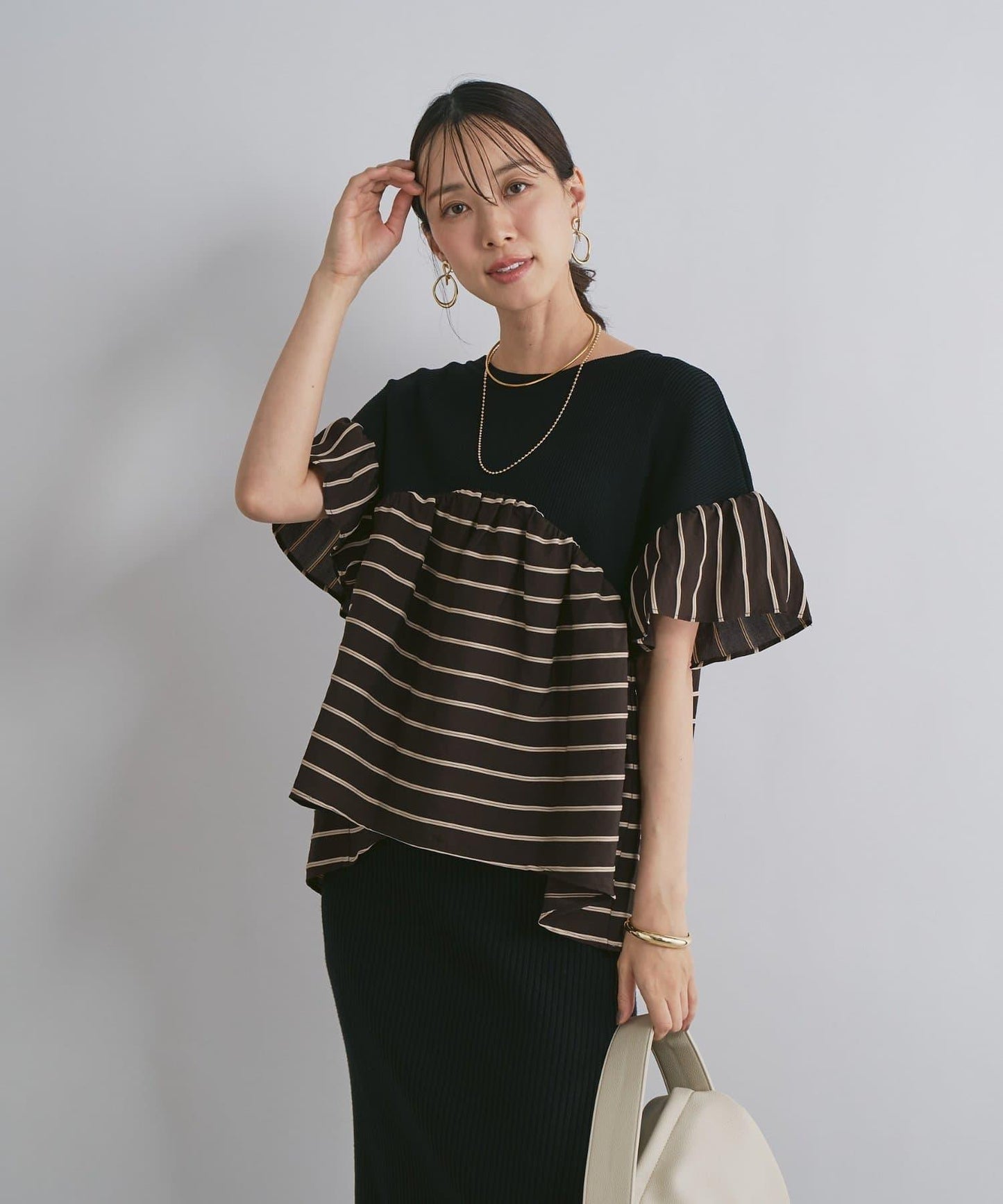 一件穿出時尚感針織拼接提花條紋