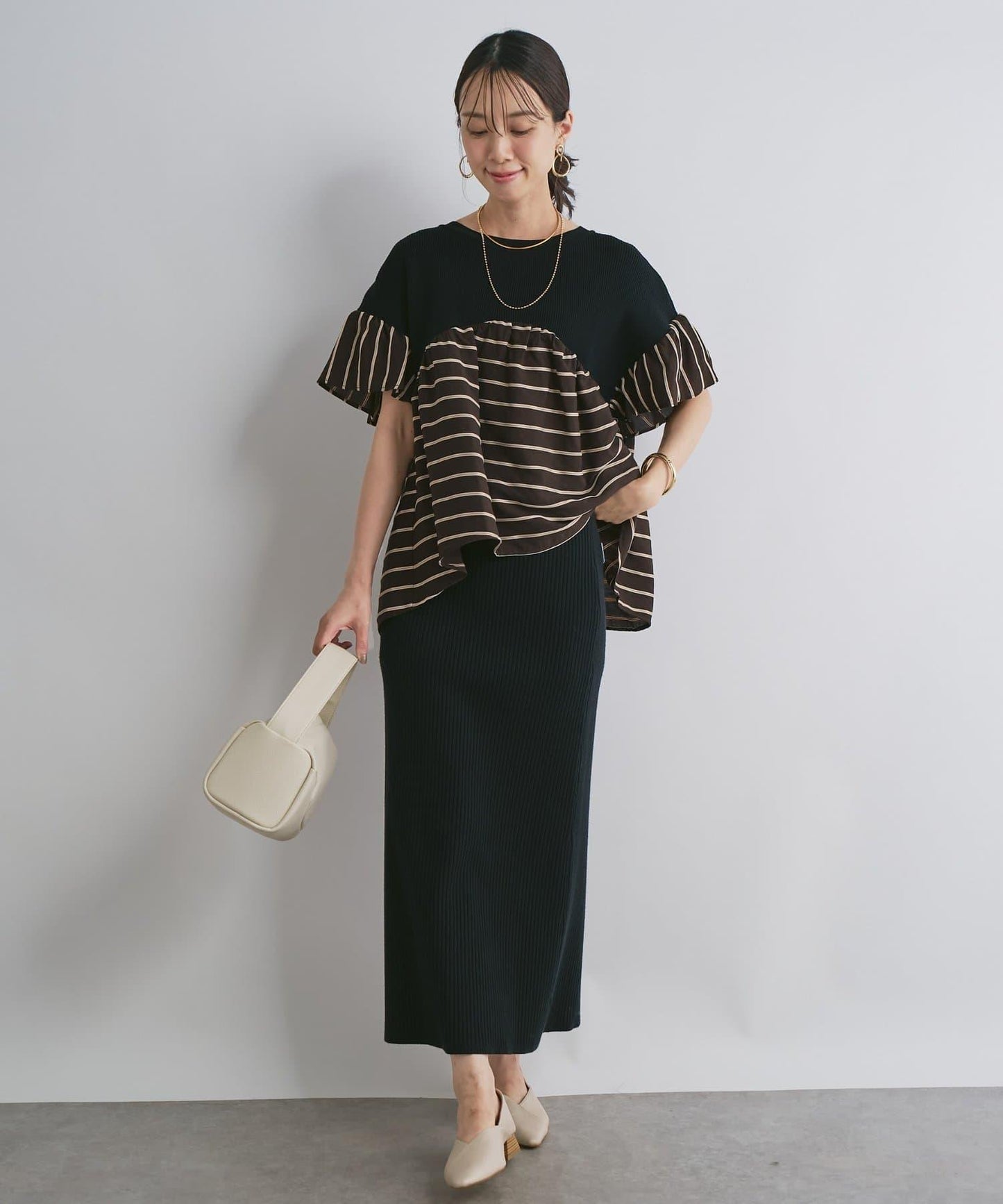 一件穿出時尚感針織拼接提花條紋